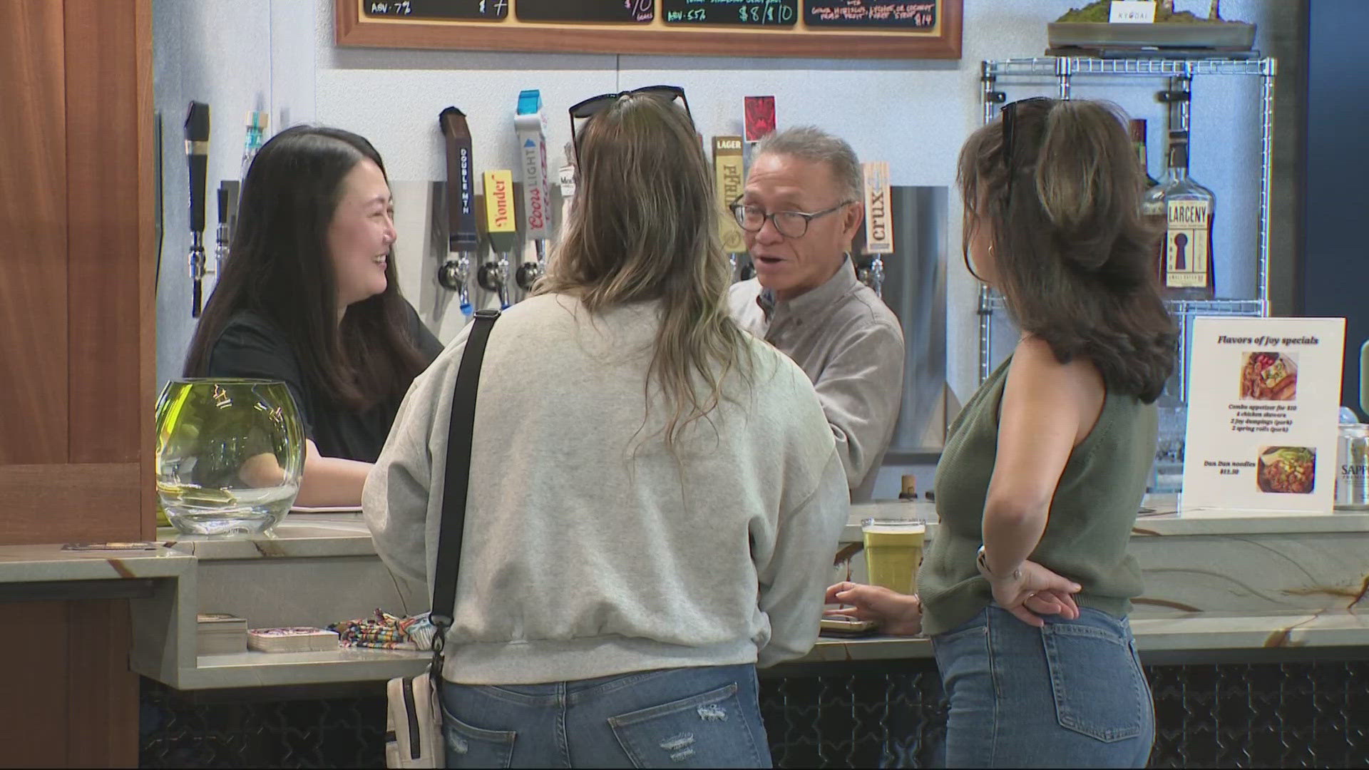 Chris Shimamoto owned Barrio, a bottle shop that was significantly damaged alongside other small businesses by a fire at Portland Mercado.