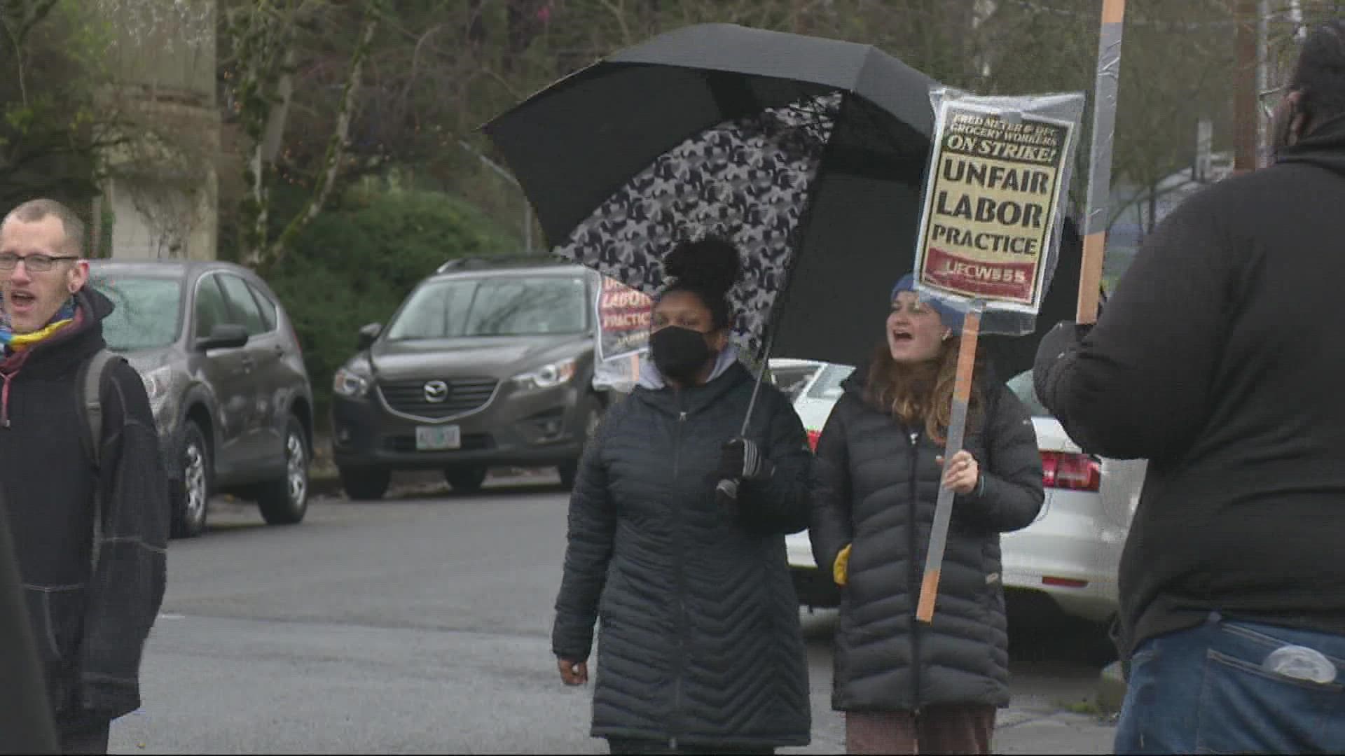 Unionized Fred Meyer workers in Portland and other Oregon stores walked off the job and began picketing Friday morning.