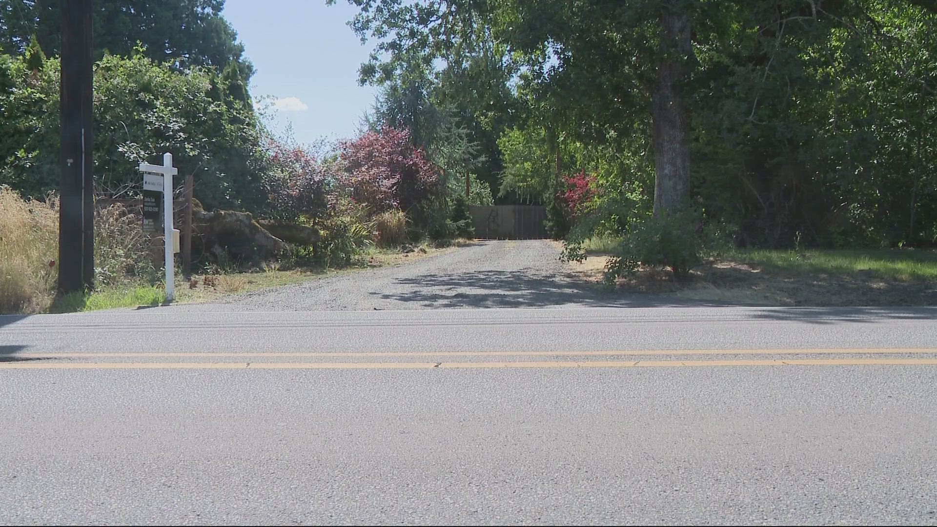 A person doing work on the vacant property near Wilsonville, which is currently in the process of being sold, found the woman's body.