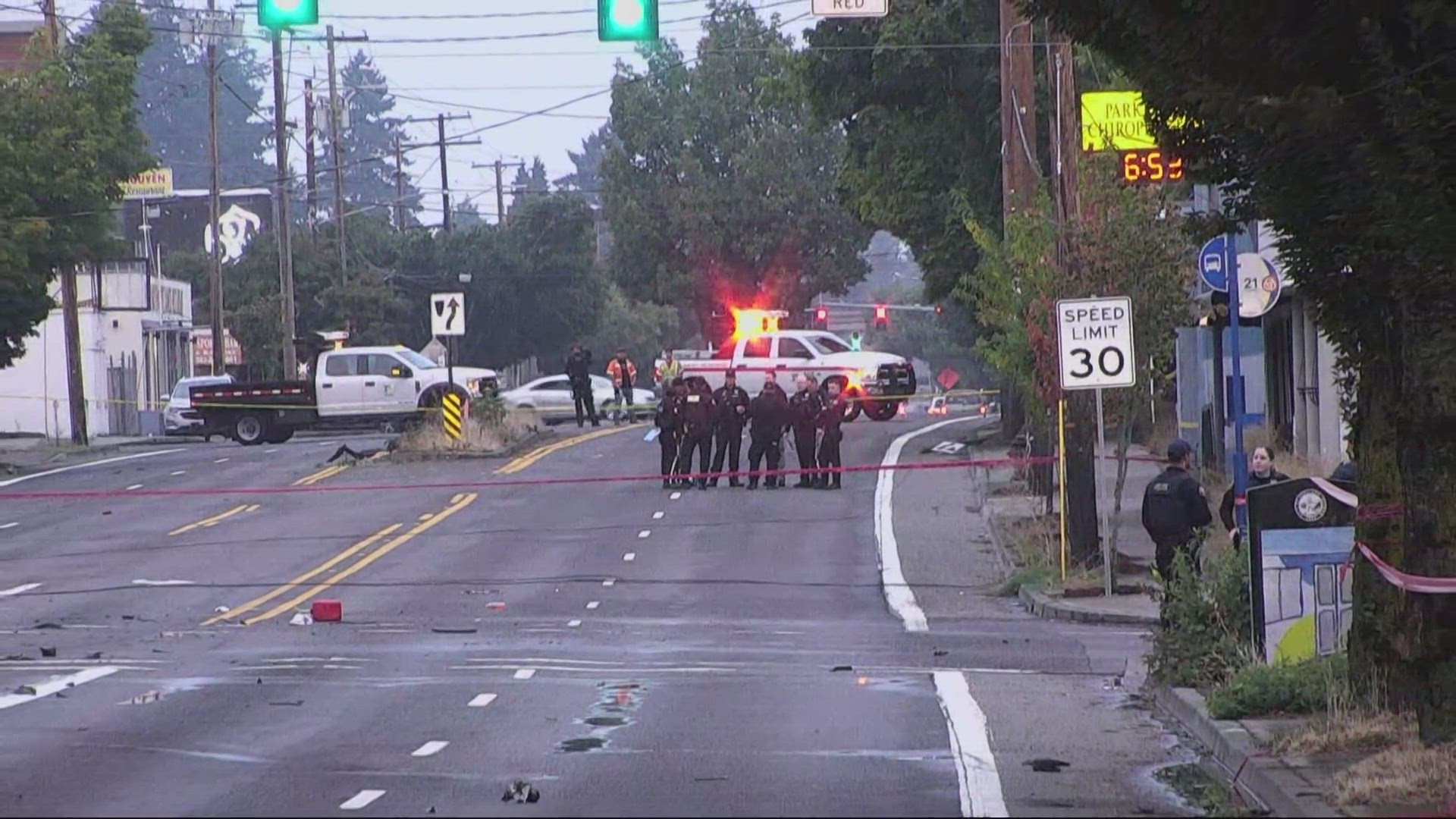 A car crashed into a power pole. One person died. Northeast Sandy Boulevard is closed between 109th and 112th avenues.