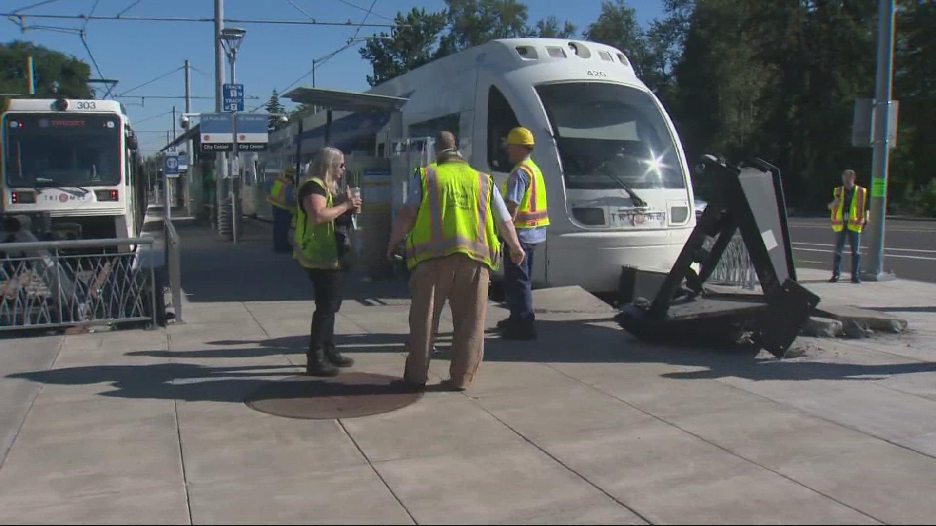 The operator of the train was taken to the hospital. Two passengers were evaluated for minor injuries at the scene.