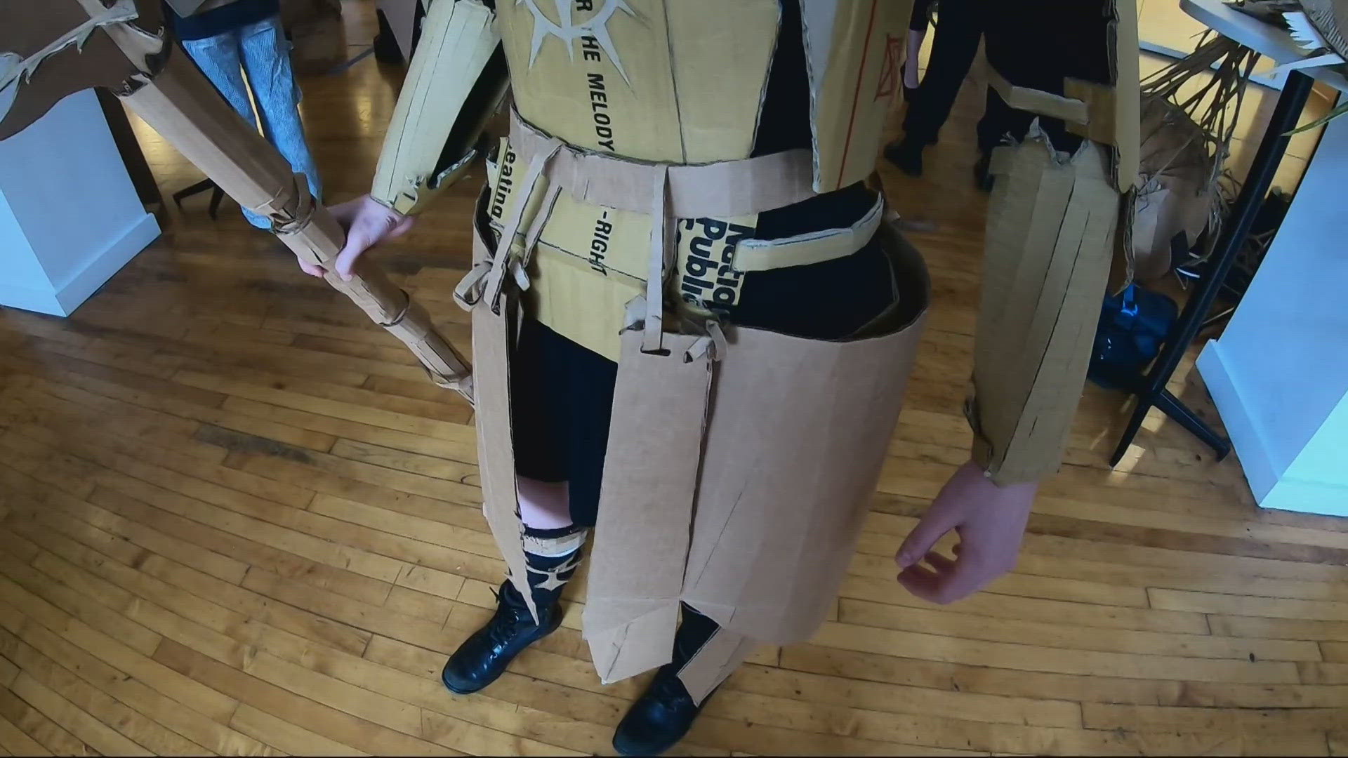 An annual fashion show at Willamette University's Pacific Northwest College of Art challenges students to make cardboard outfits without glue or tape.