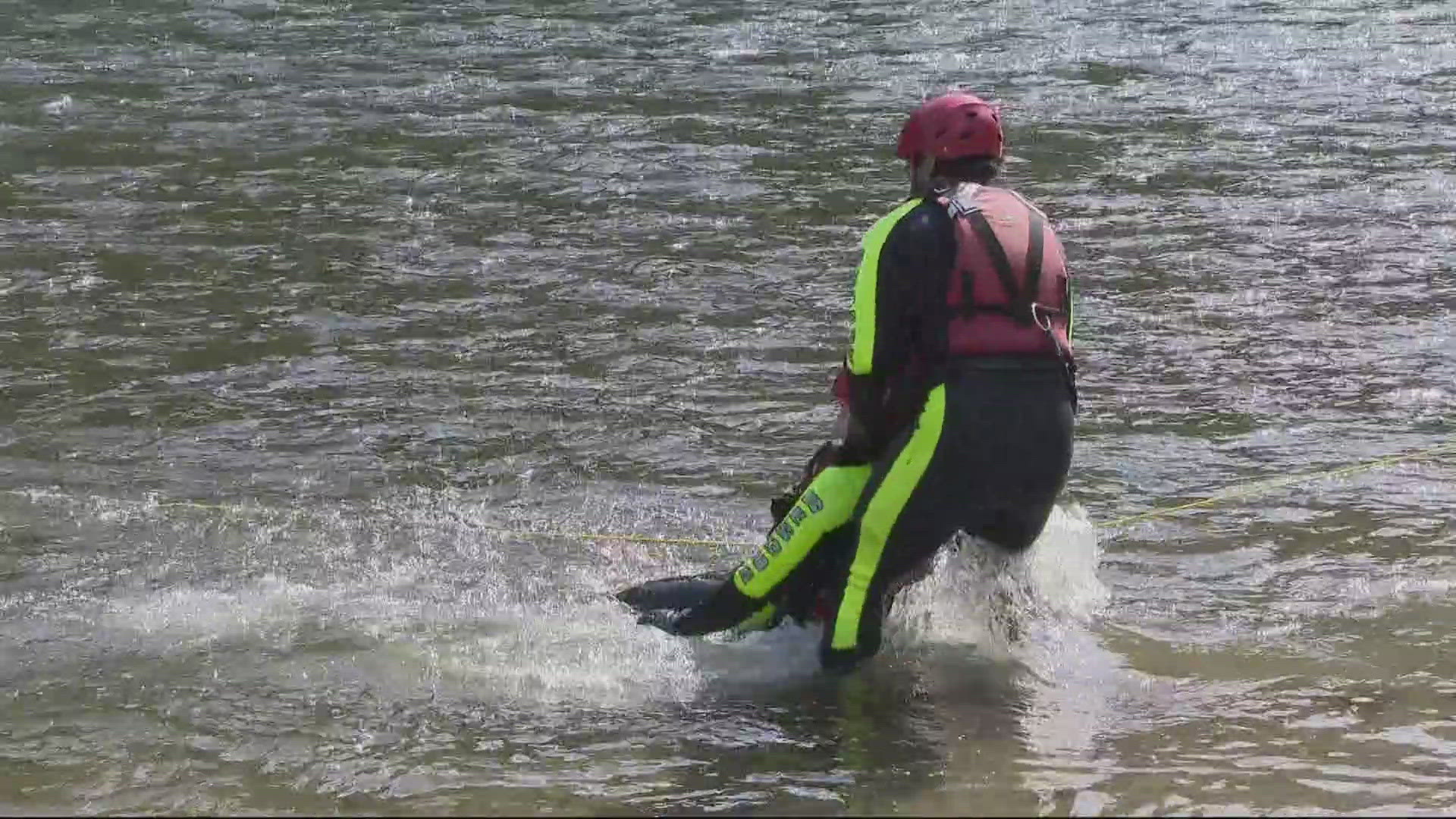 At Glenn Otto Park on the Sandy River, lifeguards demonstrated rope bag throws, paddleboard entries, kayak rescues and deep water dives.