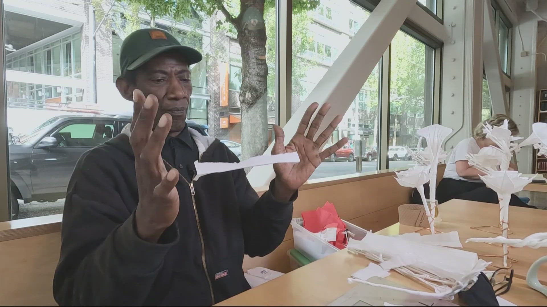 At Guilder Cafe inside Powell's City of Books, Arnold Drake World conjures beauty out of thin air and paper napkins. It's his hobby, honed to an artform.