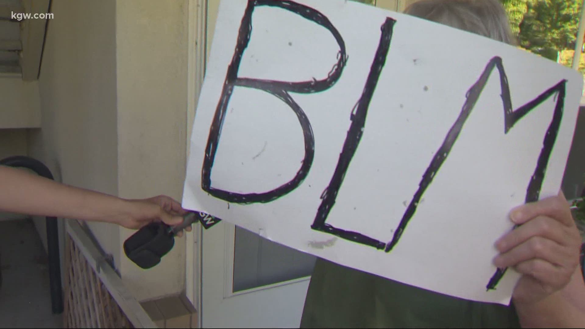 On the second night of vandalism outside the Portland Police Bureau’s East Precinct, two neighbors stood up against protesters responsible for the destruction.