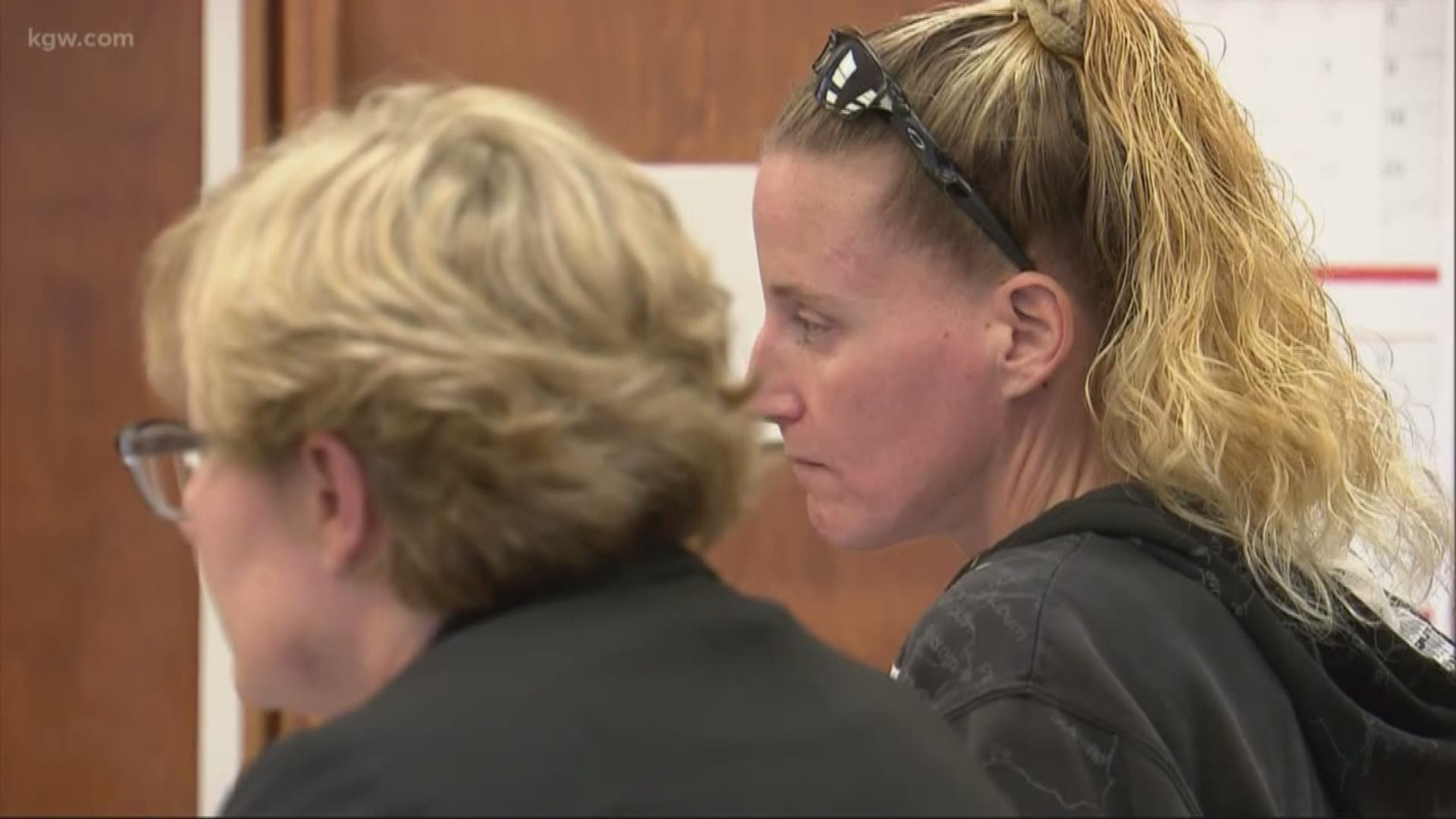 Woman who yelled racial slurs at black couple appears in court