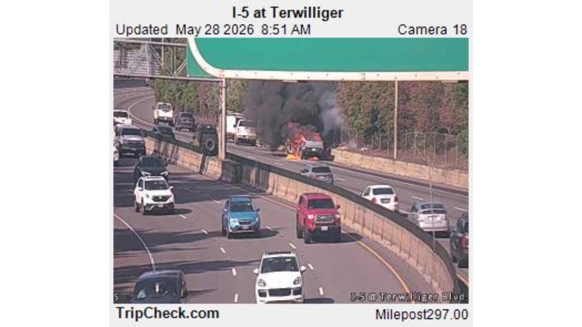 Car engulfed in flames on I-5; traffic backed near Terwilliger Boulevard