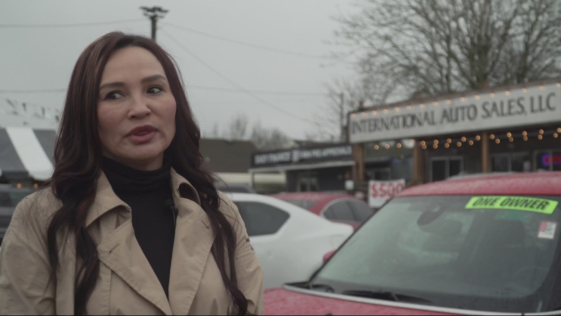 Owner of International Auto Sales on SE 82nd Avenue wants to remain in the community, but doesn't know how long she can keep taking these losses