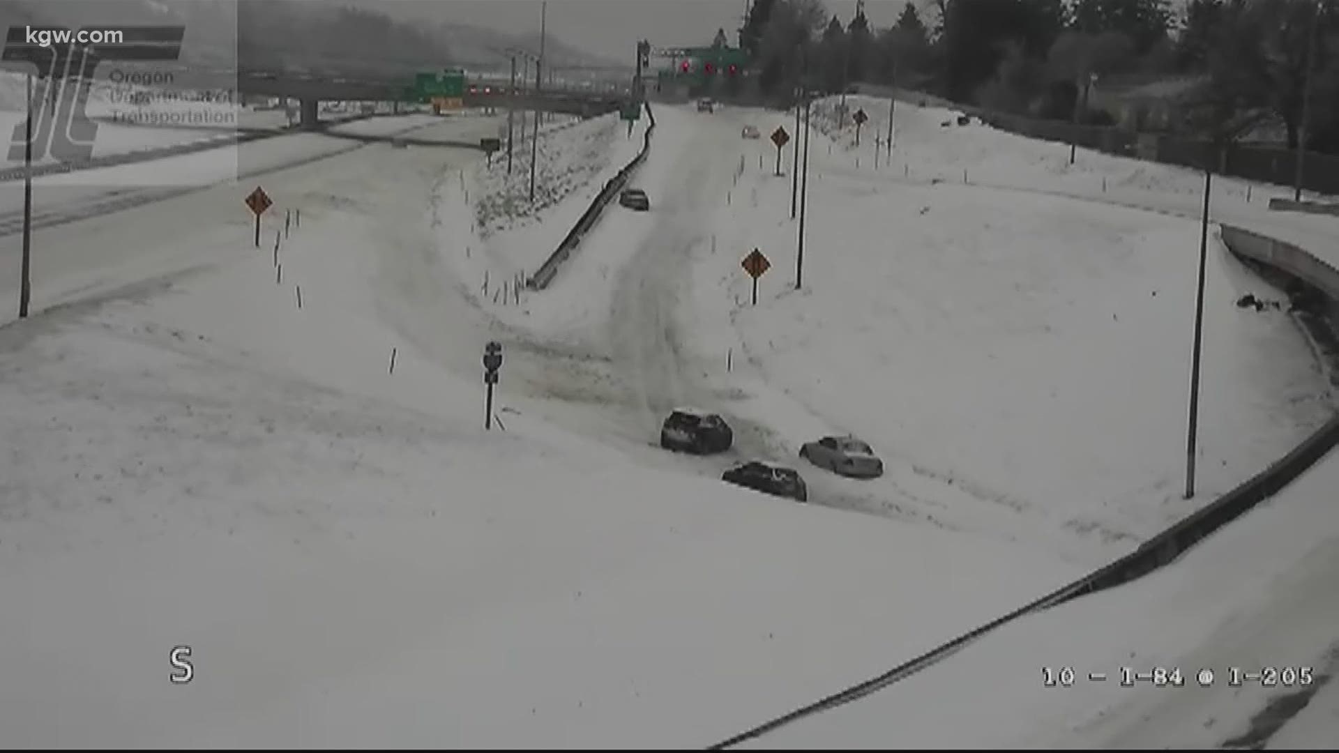 Snow and freezing rain from a winter storm have led to snow-covered roads in the Columbia River Gorge and traffic issues in the Portland metro area.