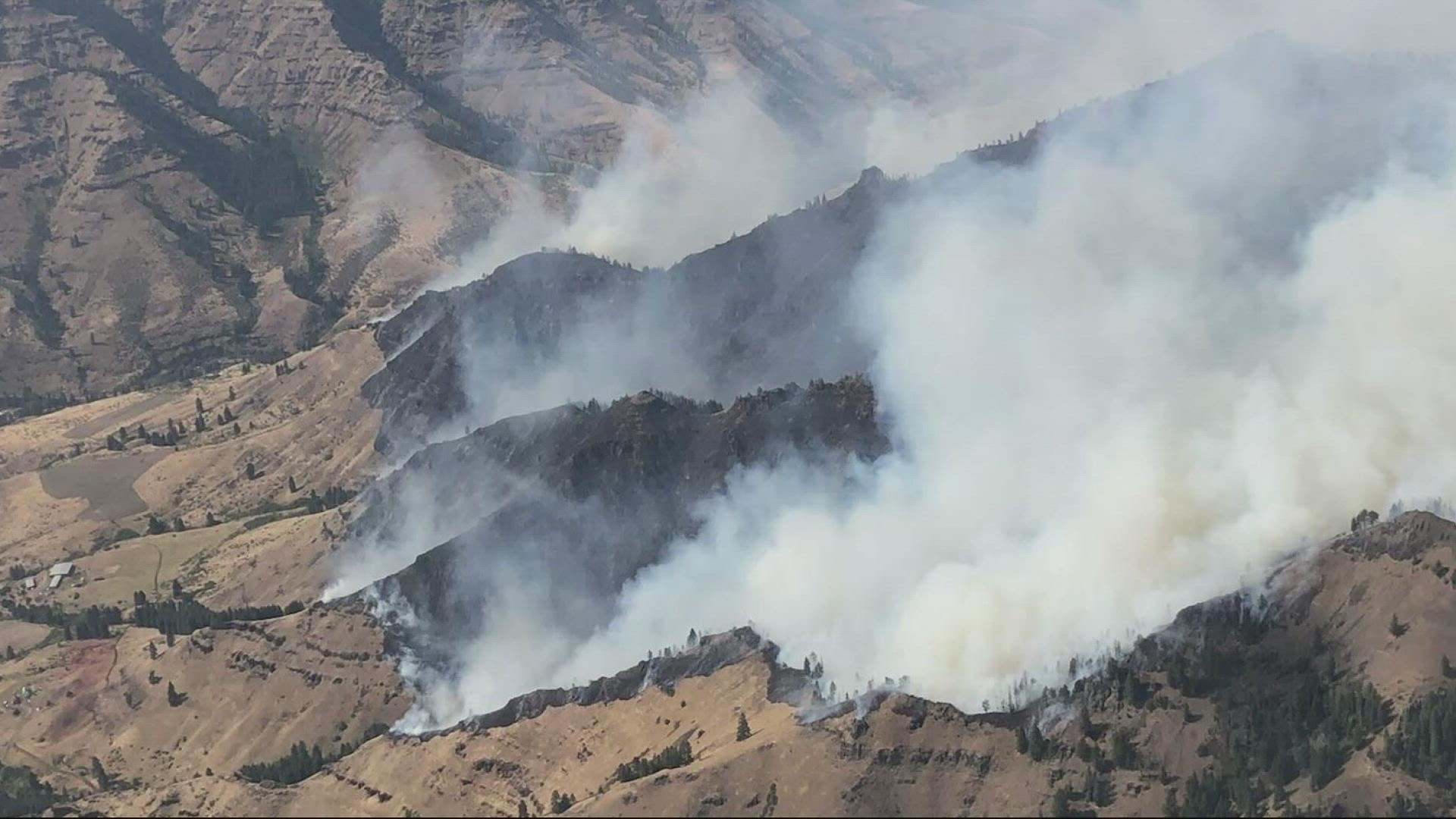 Double Creek Fire in Wallowa County in Northeast Oregon is threating structures and has forced evacuations while Rum Creek Fire continues to burn.