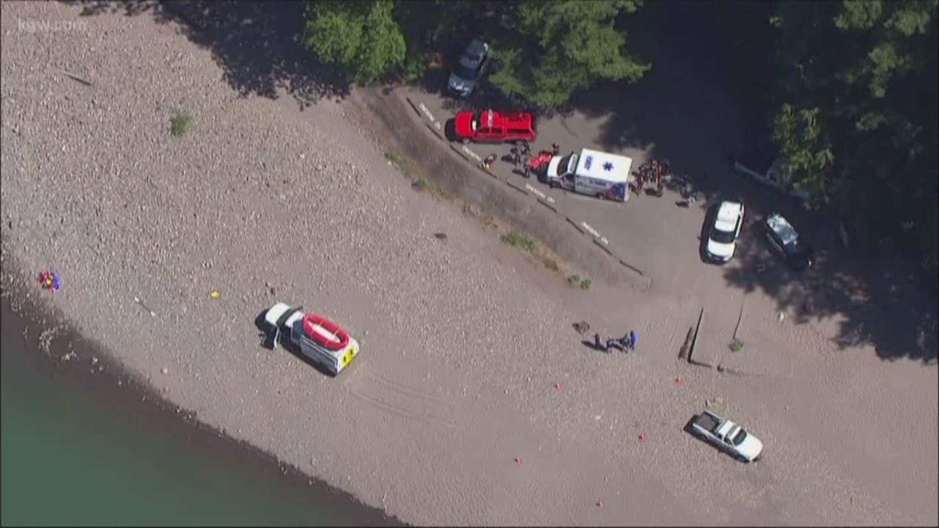 The boy was swimming in the Sandy River with family.