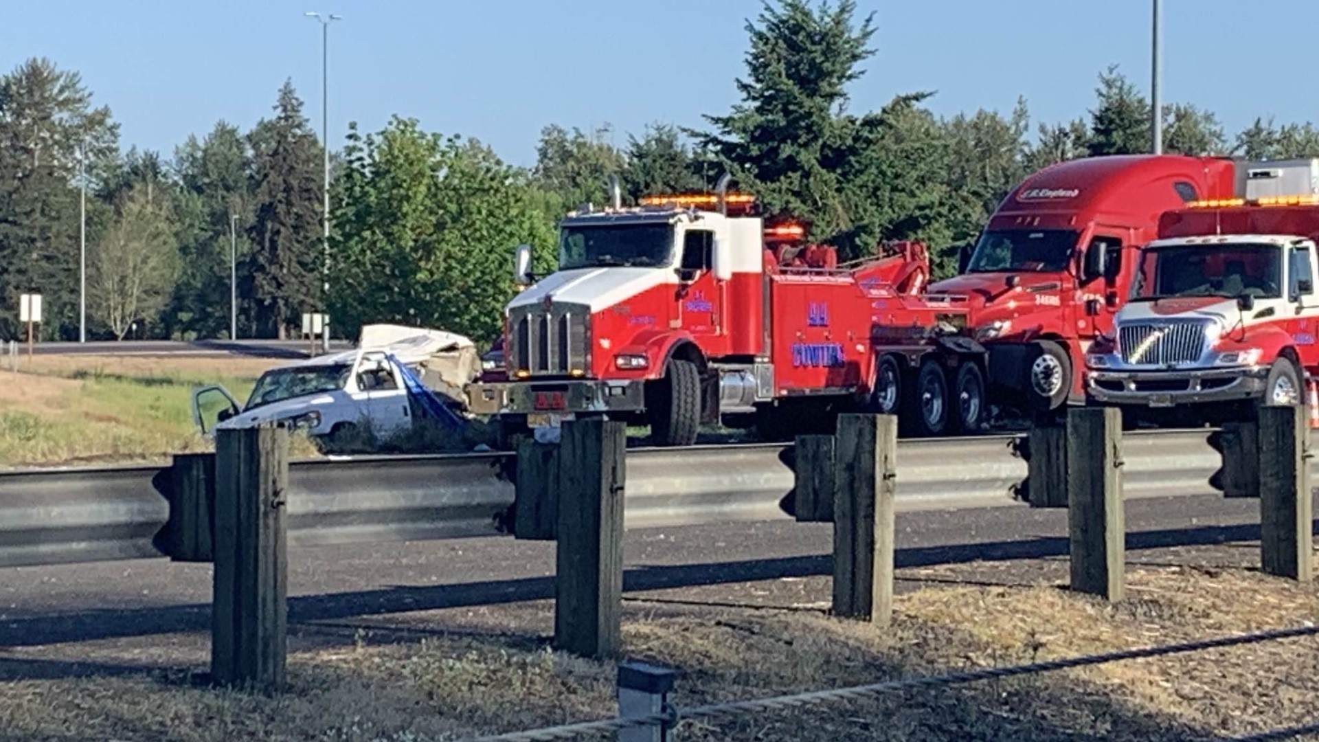 I-5 northbound is closed at the crash site and drivers are being detoured. The crash involved one passenger vehicle and two semi trucks, police said.