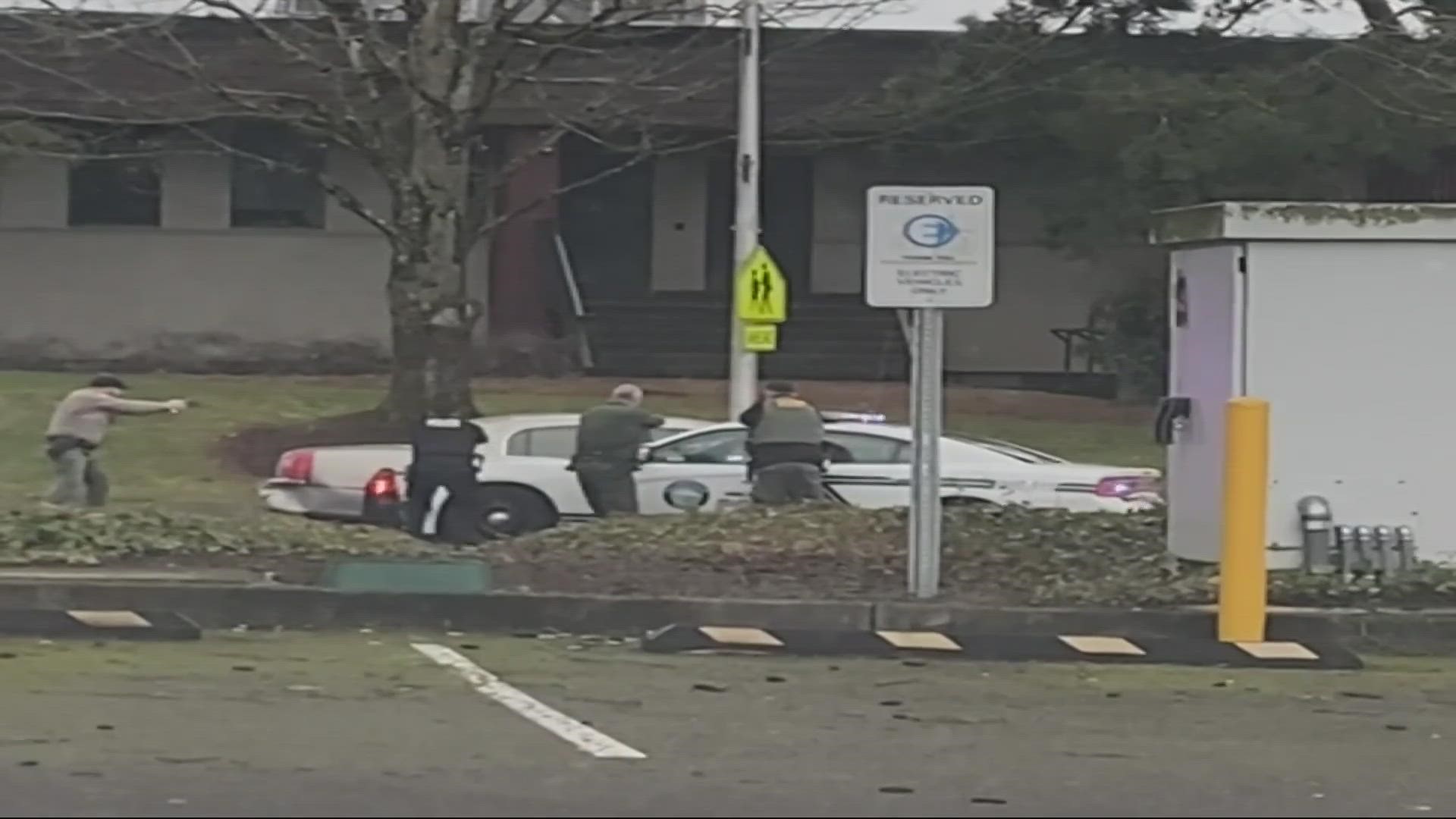 Video captured at the scene shows the moment when Clackamas County deputies and Wilsonville police opened fire at a car with two people inside.