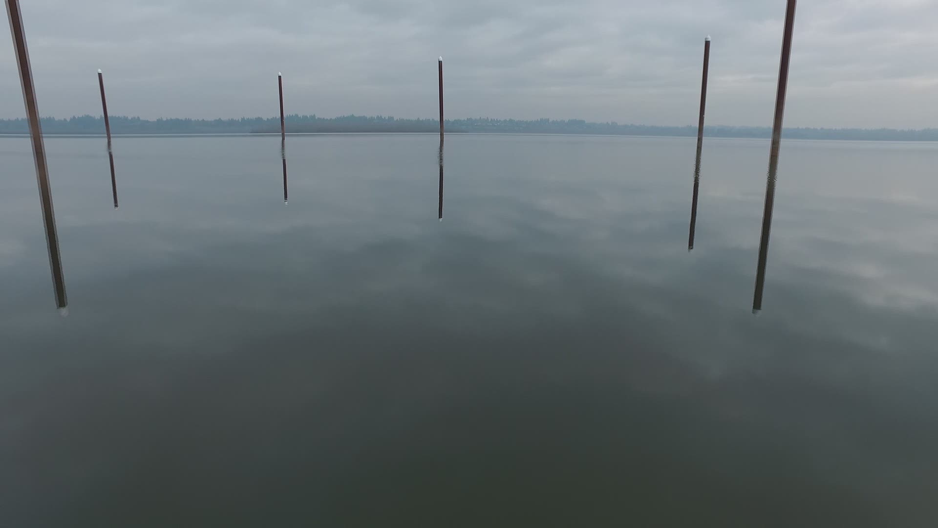 Drone video of clouds and breakers reflecting in Vancouver Lake in early February