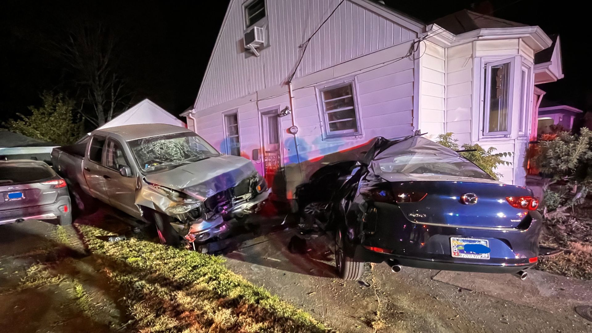 Two displaced after truck slams car into Portland home | kgw.com