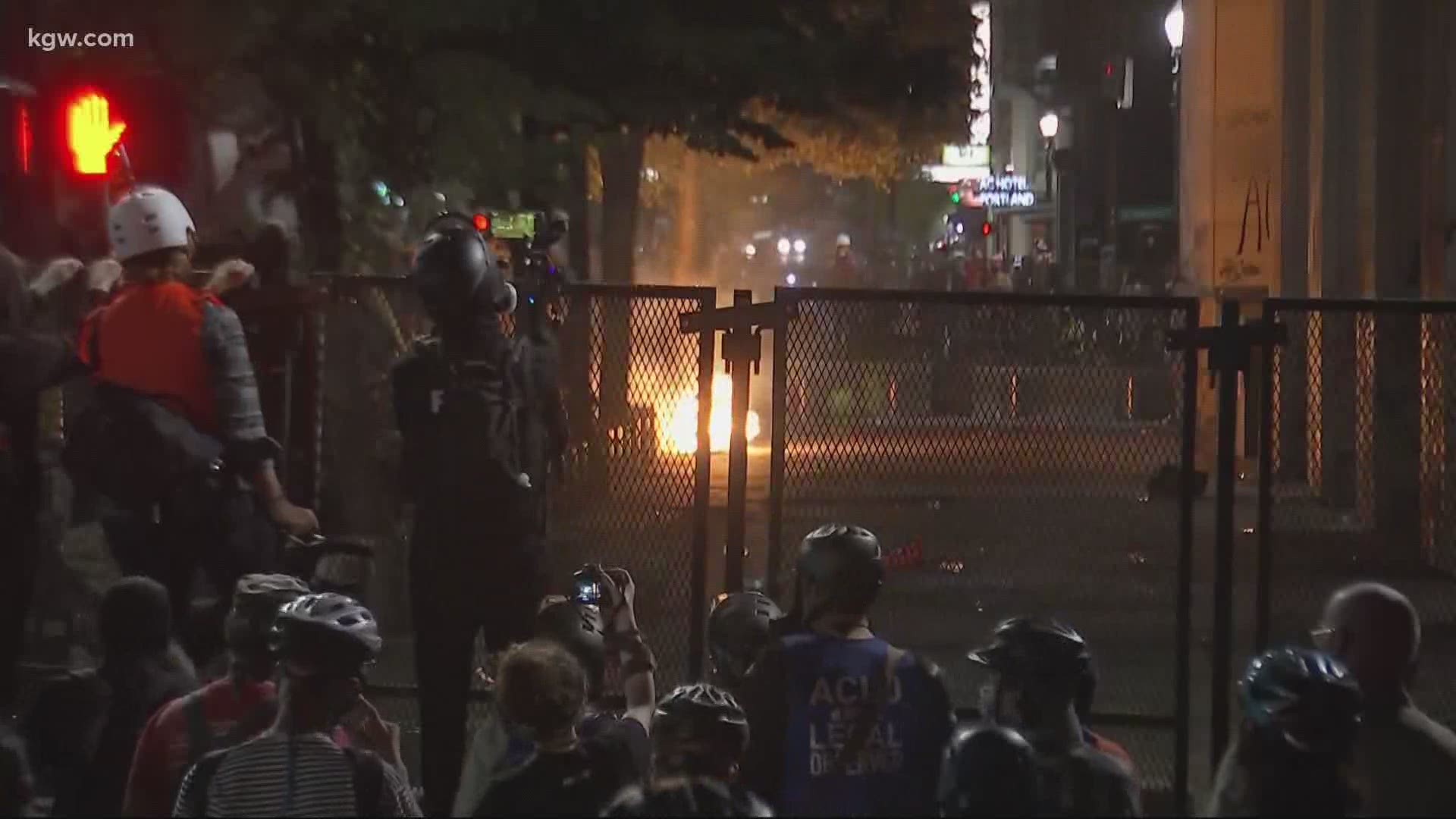 Federal officers used tear gas after some people lit fires inside the fence near the federal courthouse.