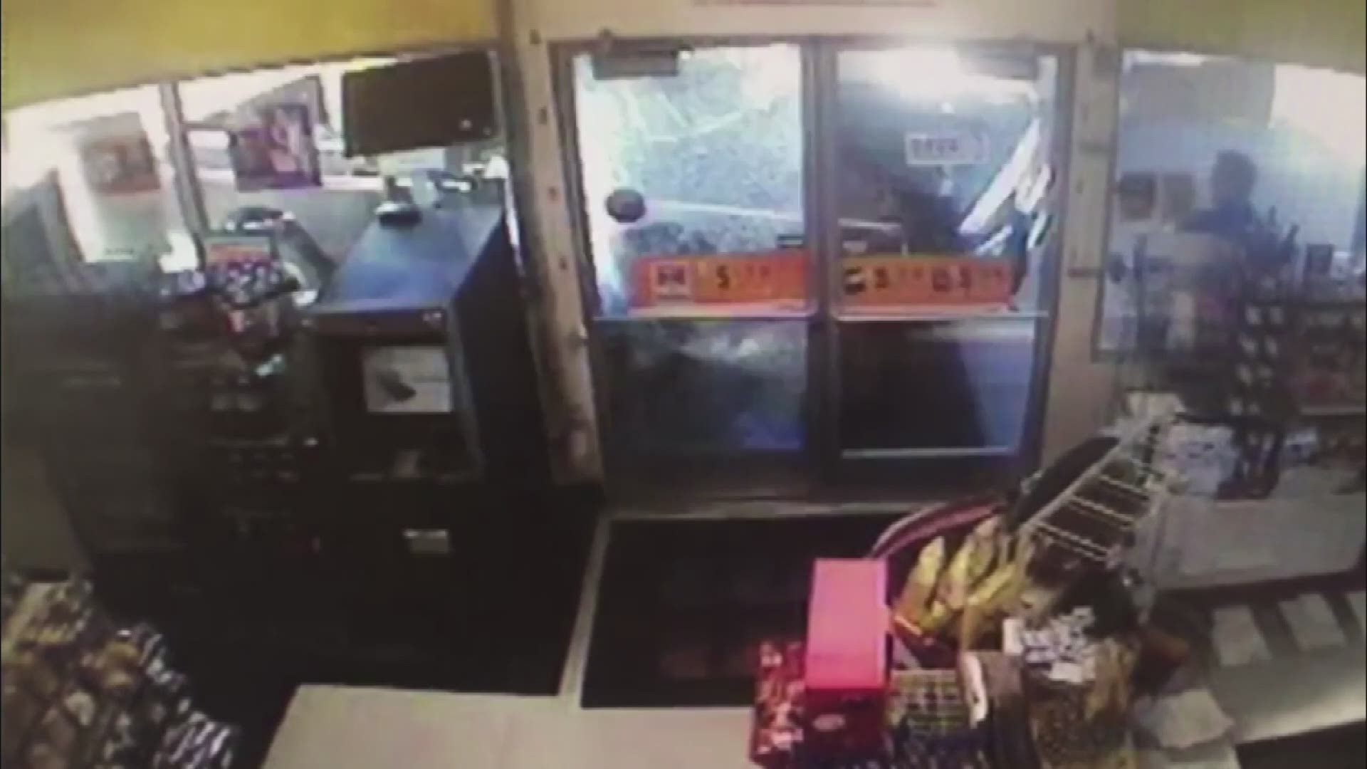Surveillance video from the Arco in North Plains shows a pickup truck hitting the gas station and and employee