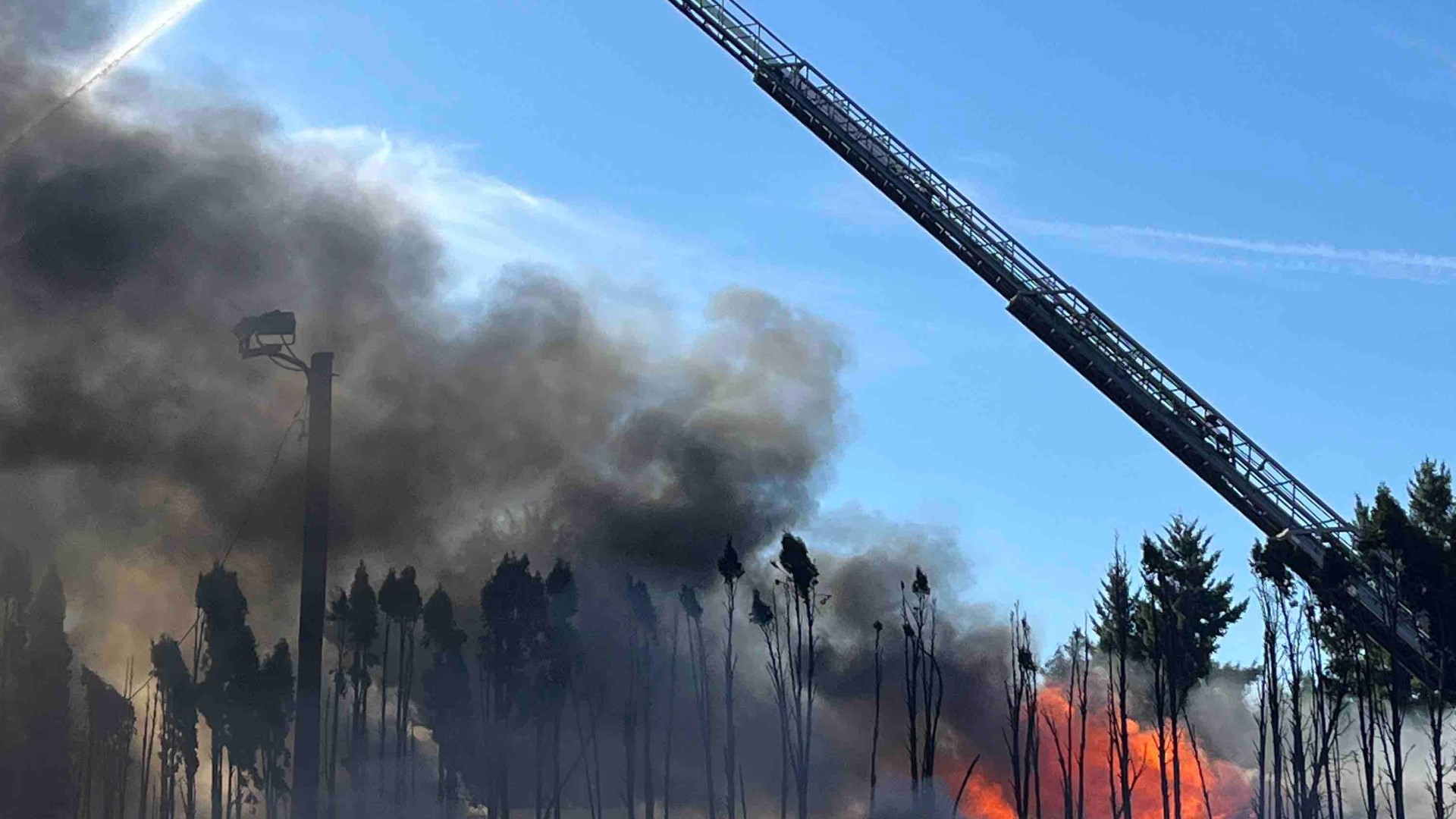 Southbound lanes of Southeast McLaughlin Boulevard near Jennings Avenue are closed as fire crews fight the fire.