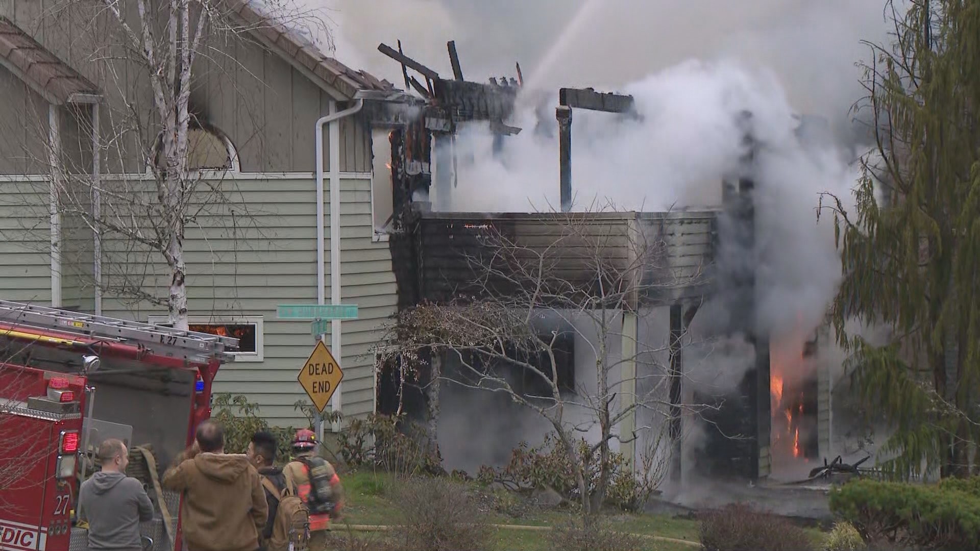 Fire crews were called to a report of an explosion at Northwest Burkhardt Court on Thursday. Crews arrived and saw the fire was spreading from one home to a second.