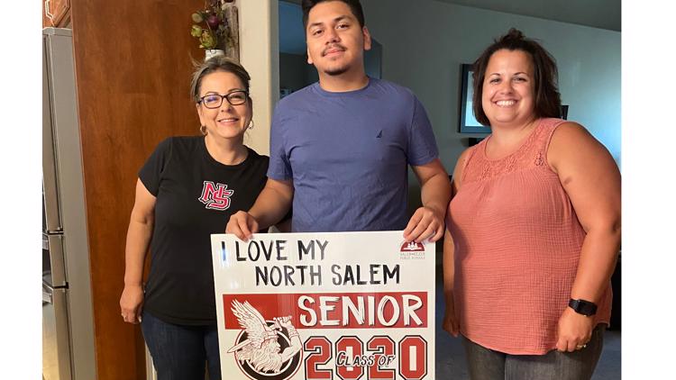 'I’m better than what I think I am': Newborn son and family motivate North Salem High School Senior to graduate