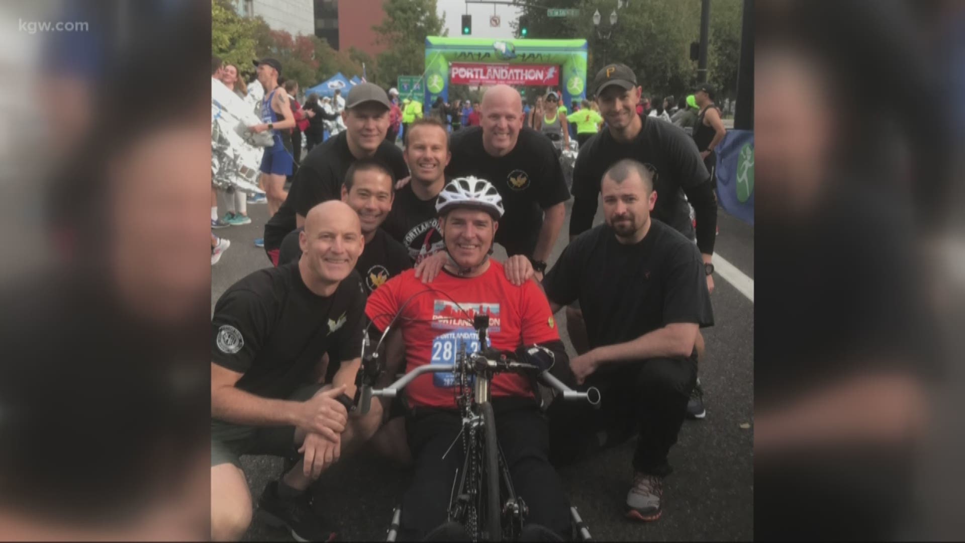 Portland Police Sgt. Paul Meyer, the first Portland police officer who uses a wheelchair to become a sergeant, took part in the Portlandathon half-marathon Sunday, and his Swat Team buddies were there to surprise him by joining him for the last mile of th