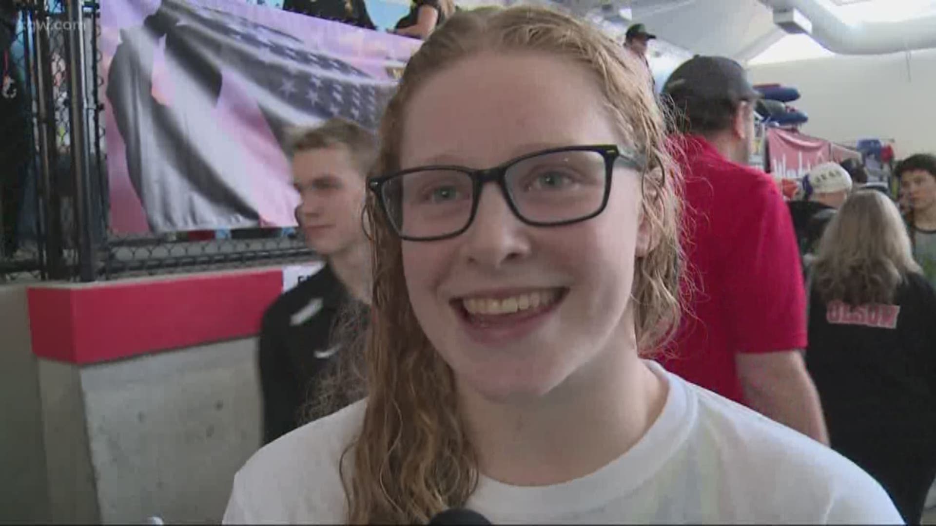 Aloha High School swimmer Kaitlyan Dobler set a national record in the 100-yard breaststroke at the Oregon high school state swim championships.
