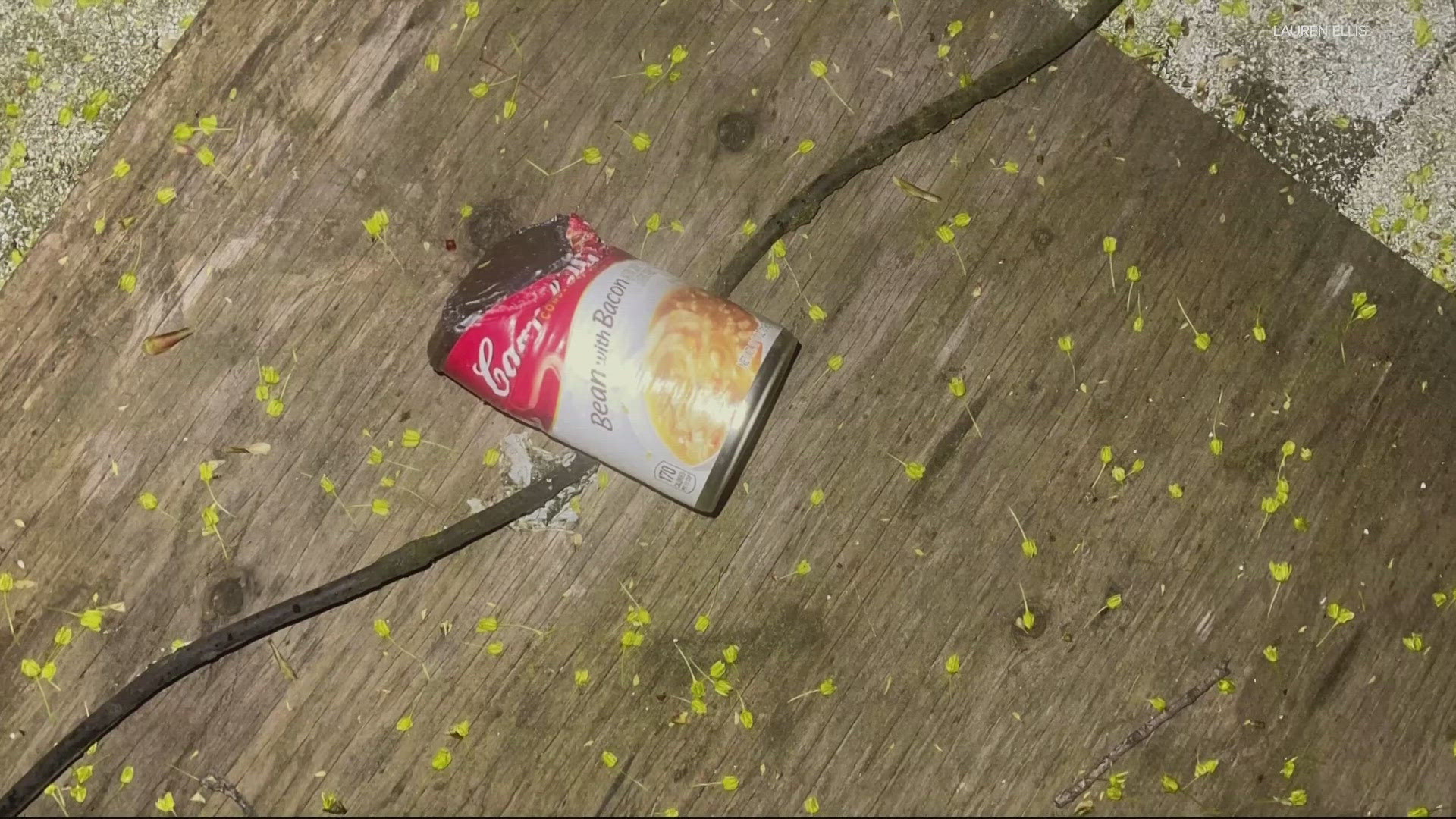 For weeks, someone has been throwing canned goods from an apartment complex on Southwest Jefferson and Broadway.