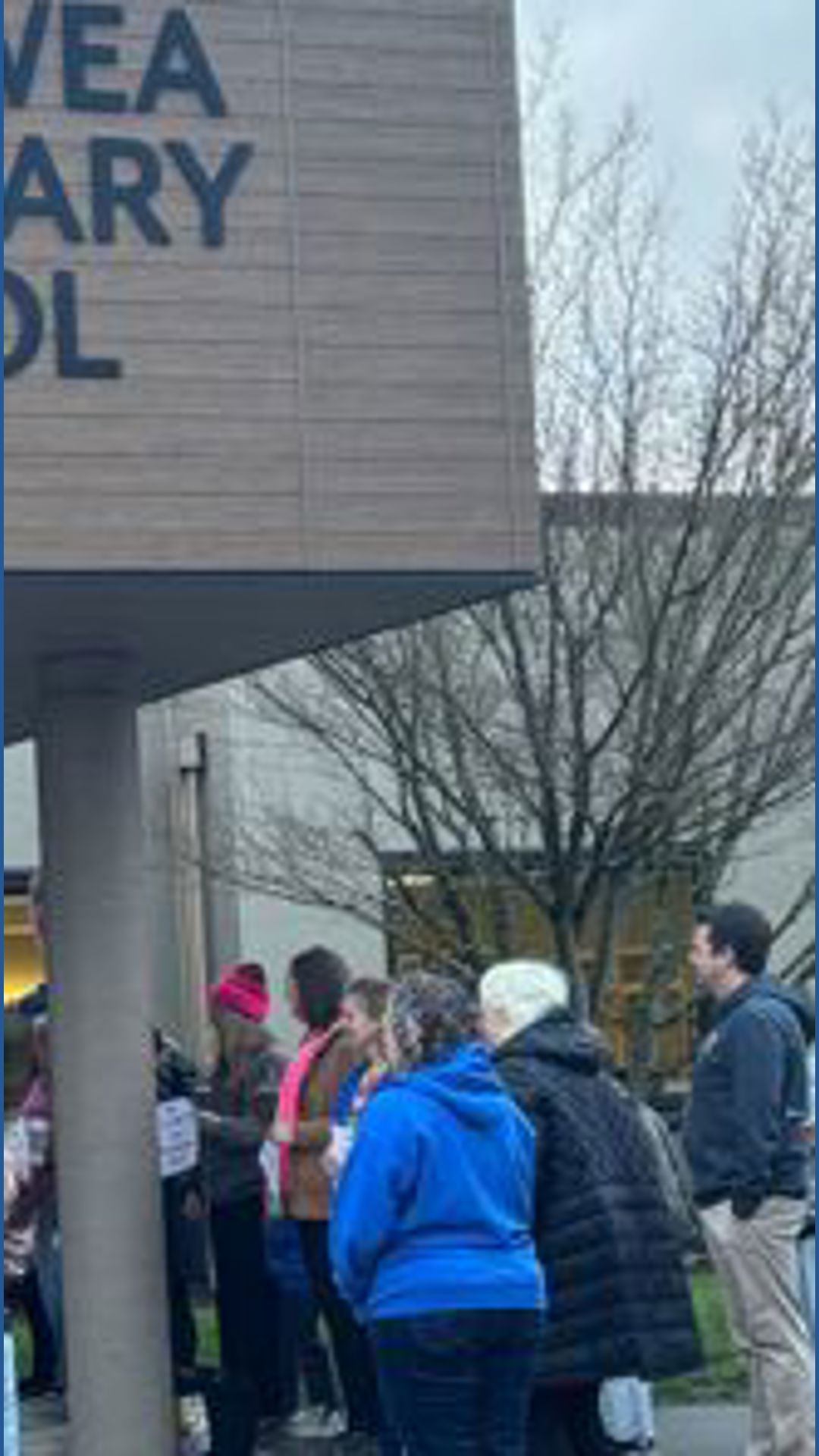 Parents and staff rally outside Vancouver Public Schools' after announced budget cuts