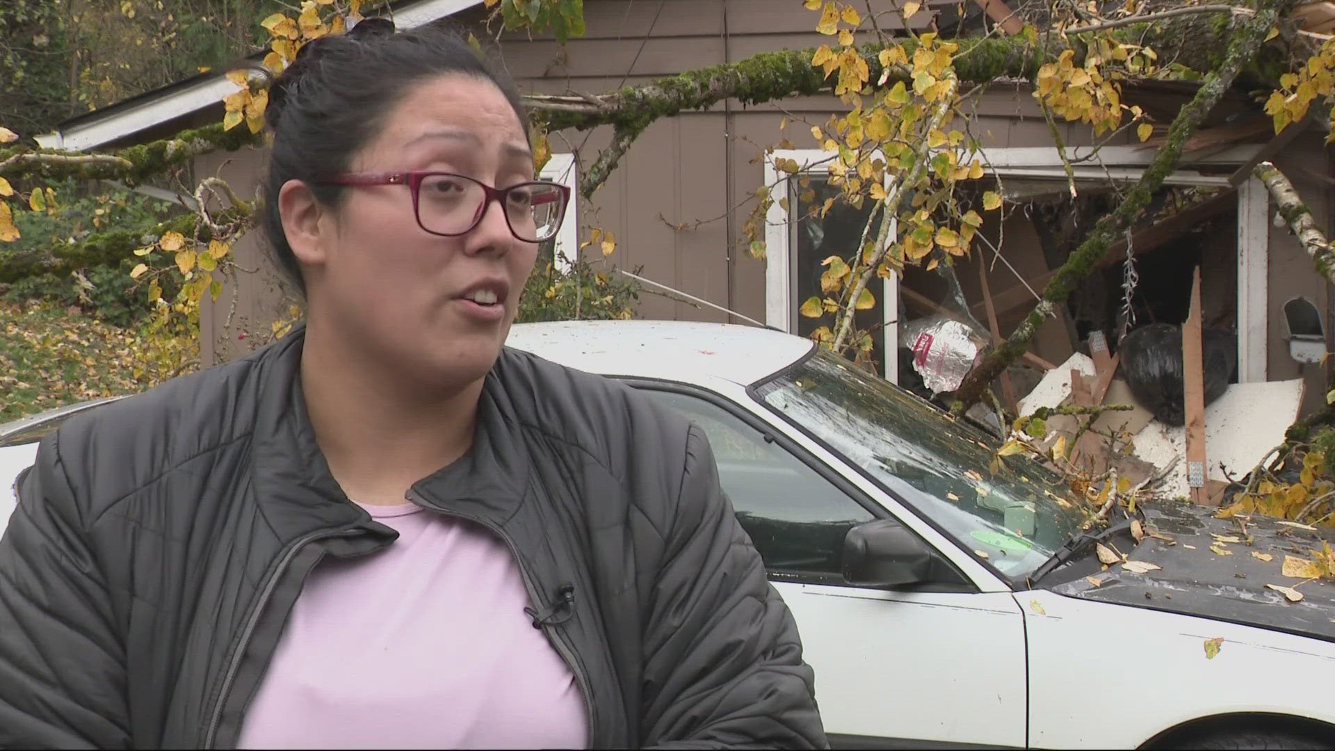 On Tuesday night, a windstorm was brewing when a tree uprooted and fell on the roof of a home just feet above from where the teen and child were. 