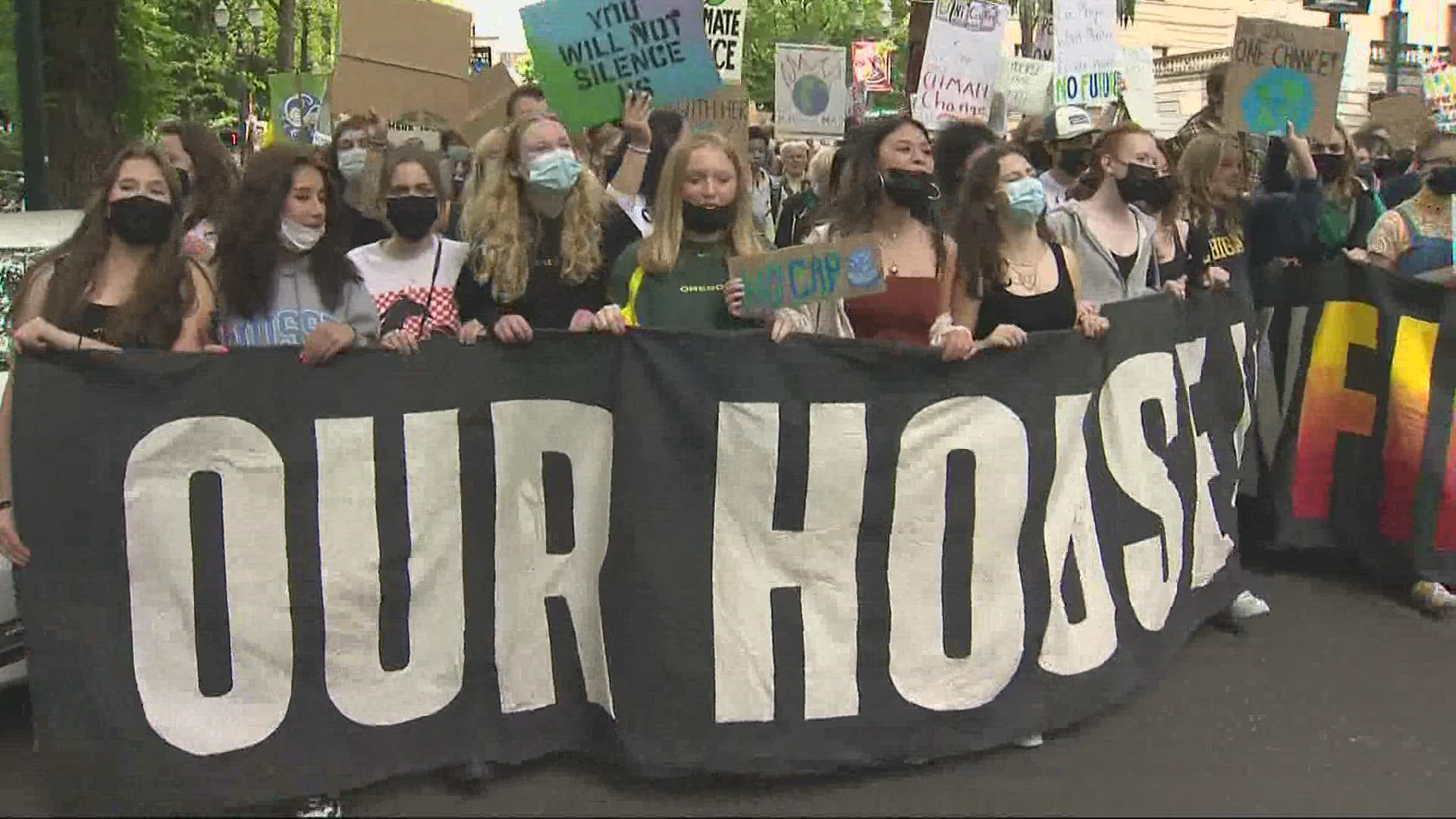 Hundreds of students walked out of class Friday for a climate strike. A large crowd rallied at Portland City Hall before marching through the city.