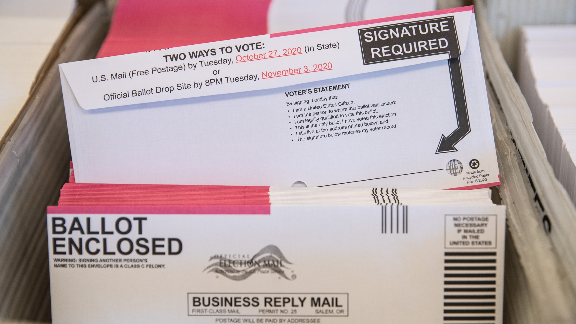 VERIFY Why are there different colored ballot return envelopes?