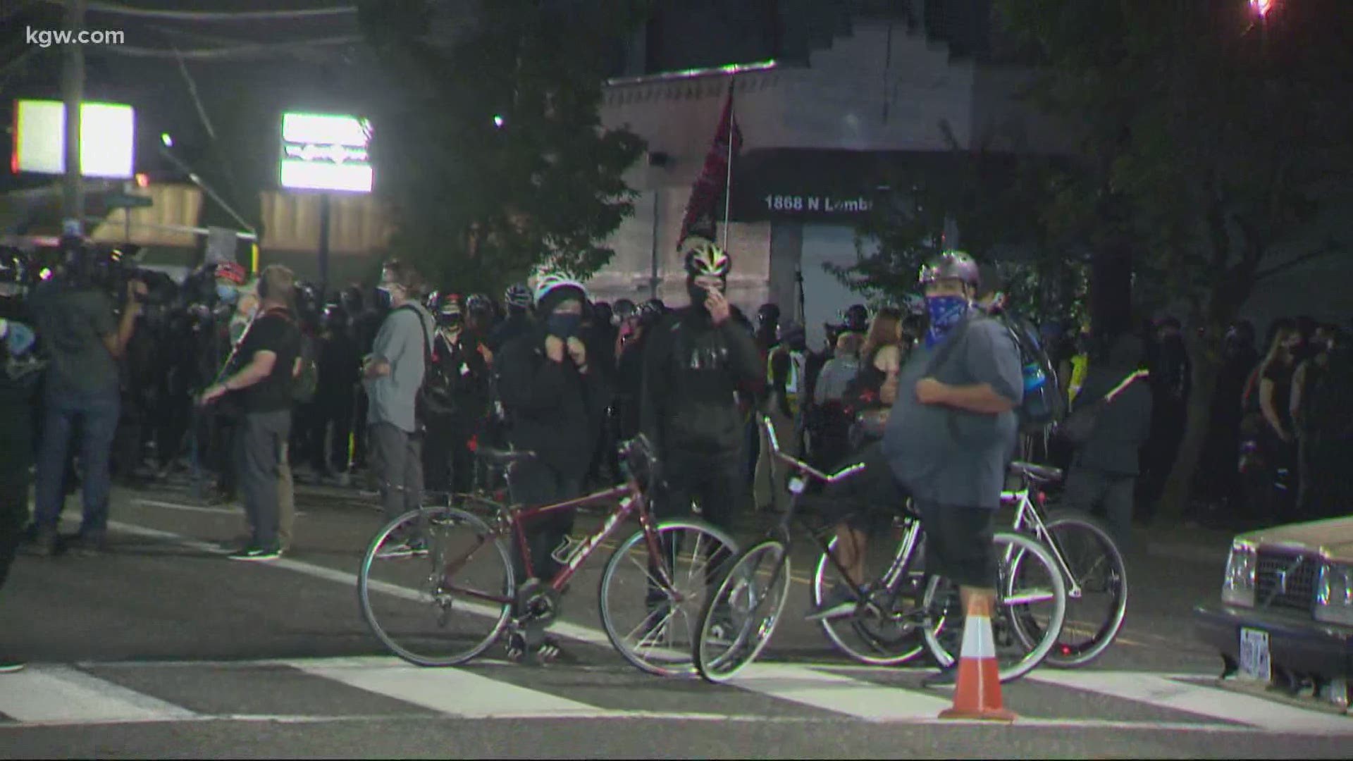 An estimated couple hundred have gathered outside the police union building in North Portland as protests continue for a 14th consecutive week.