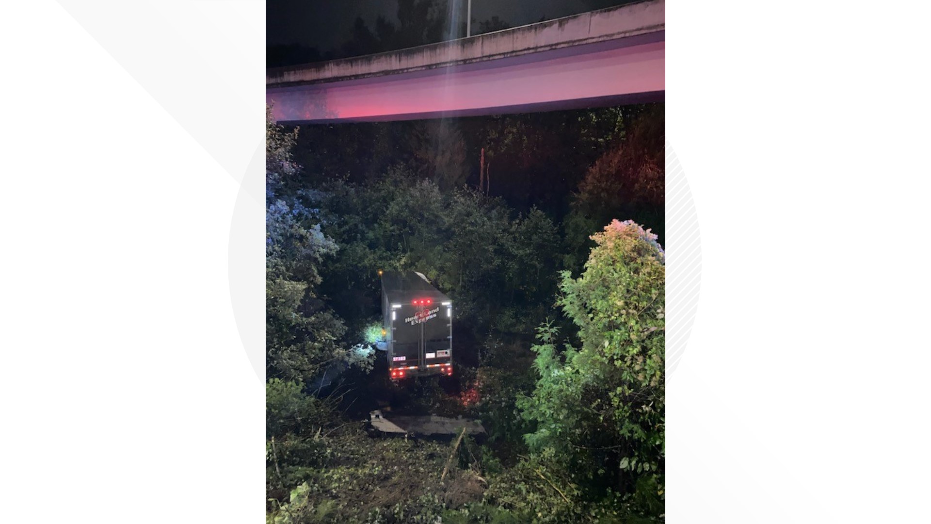 A semi-truck lost control while traveling northbound on Interstate 5 Wednesday morning. The semi hit a concrete barrier before going down an embankment.