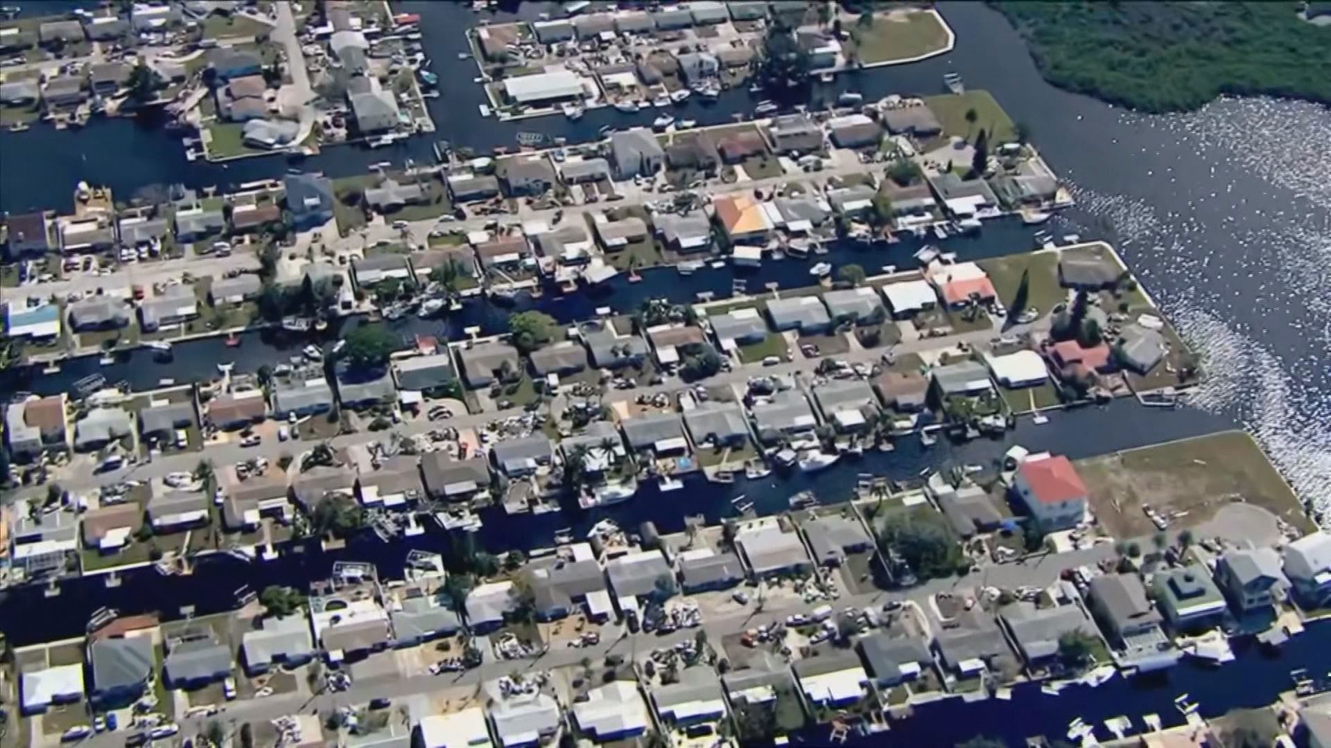 Hurricane Helene made landfall in Florida as a Category 4 hurricane. In the aftermath, families in Hudson, Florida pile damaged possessions outside their homes.