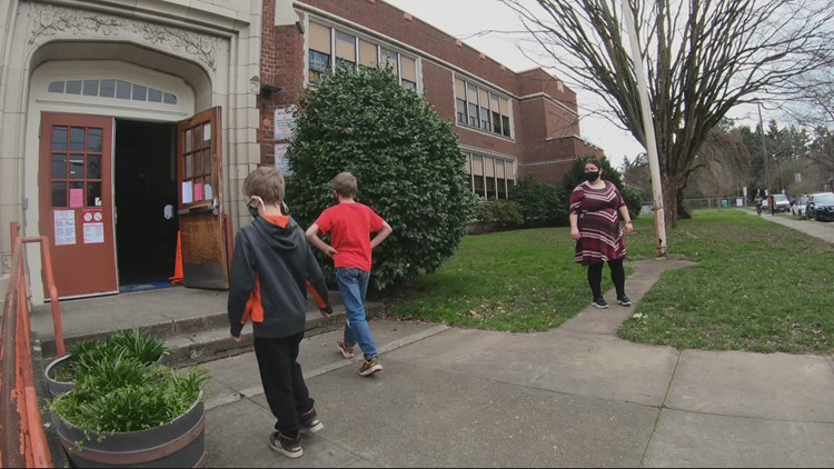 Some students back inside Woodlawn Elementary School for limited in-person learning