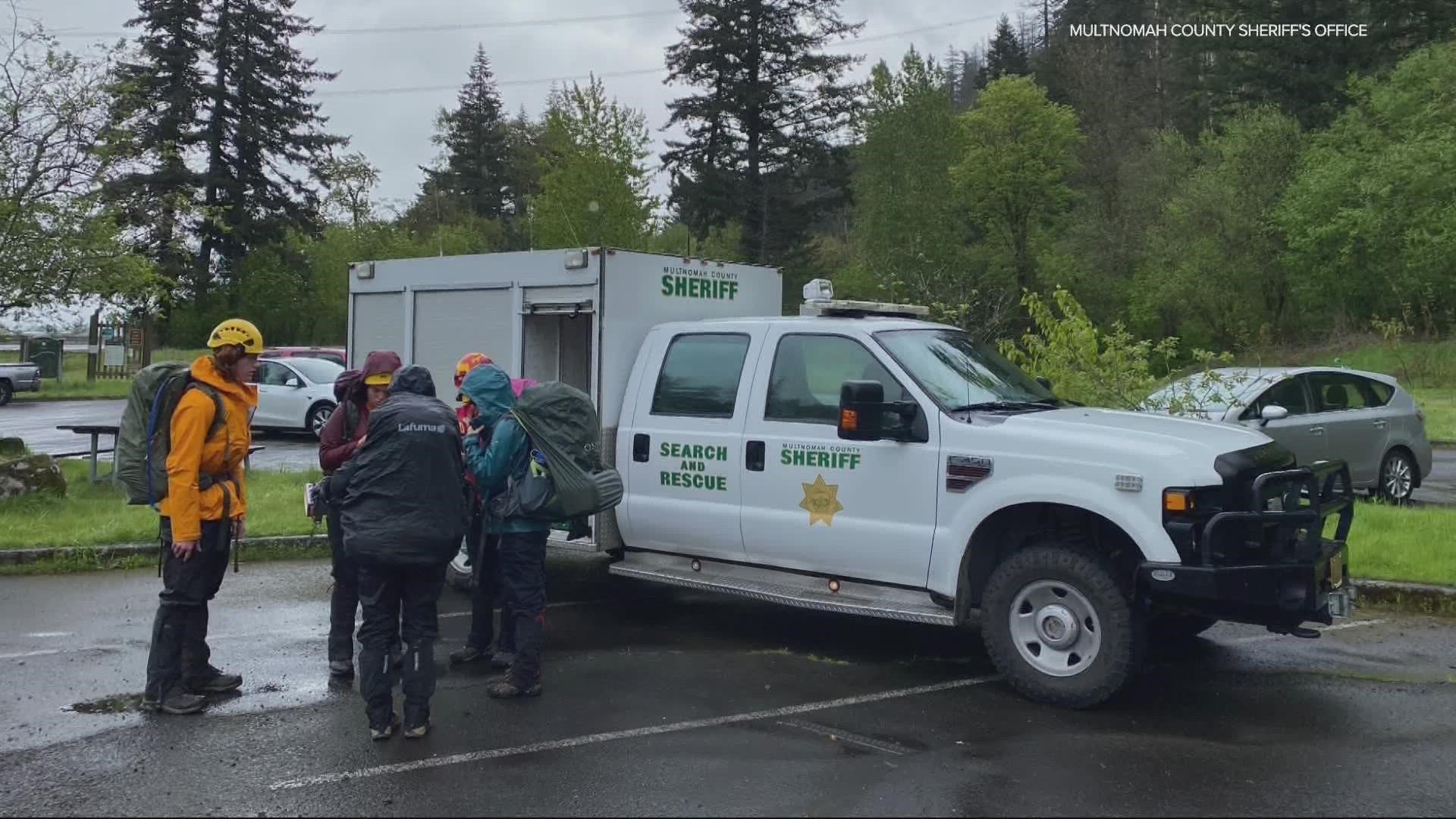 The Multnomah County Sheriff's Office dispatched teams after someone noticed a signal fire from the stranded hiker.