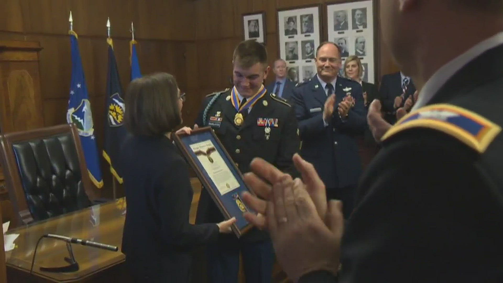 Train hero gets Distinguished Service Medal