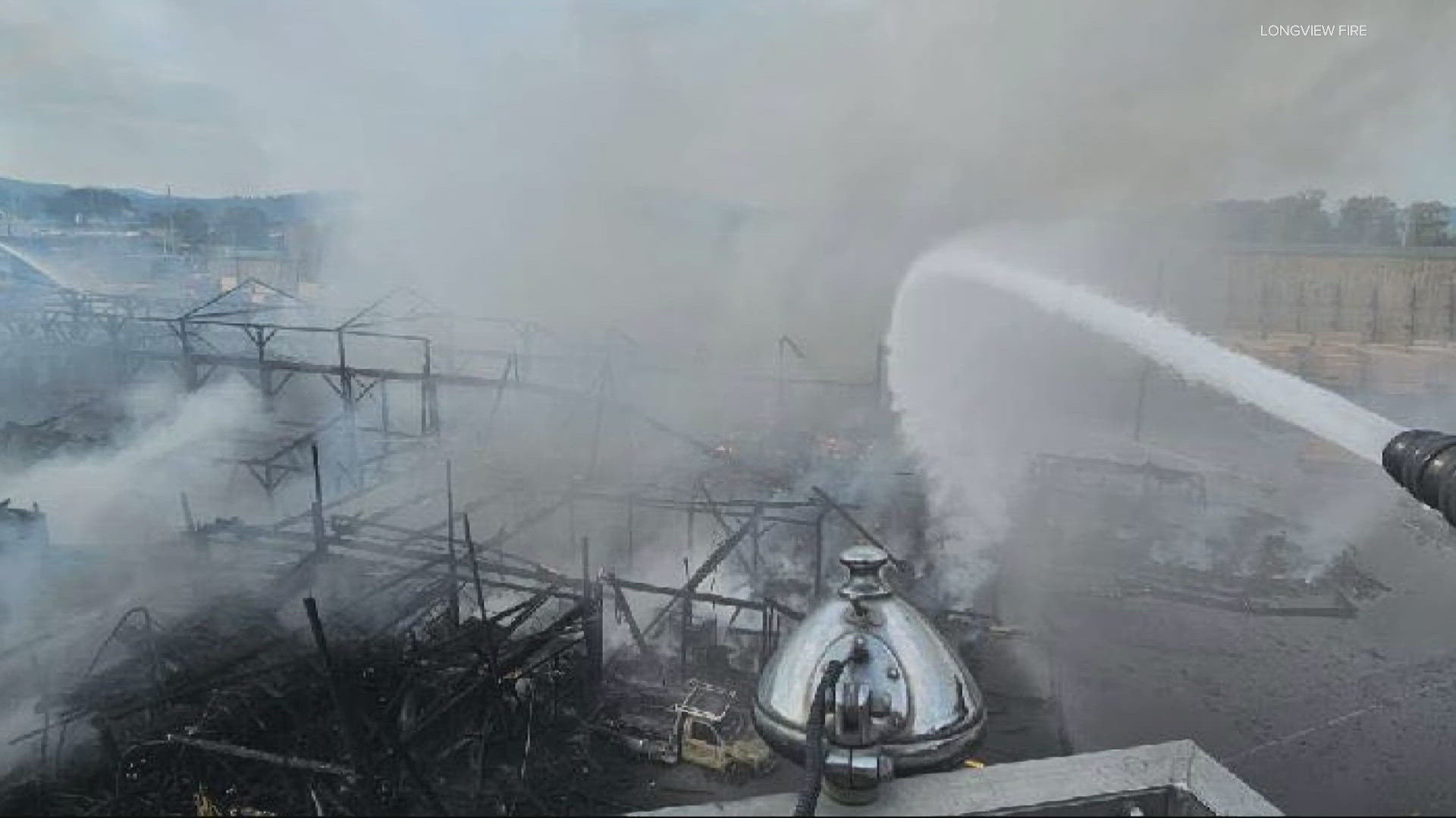 A massive blaze destroyed a Longview warehouse Monday. Firefighters contained the flames in hours. No injuries have been reported.