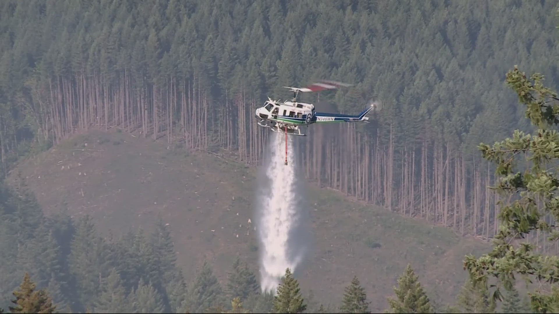 Authorities dropped evacuation levels for Bear Creek Road near the Windy River Highway. The wildfire started on Sunday.