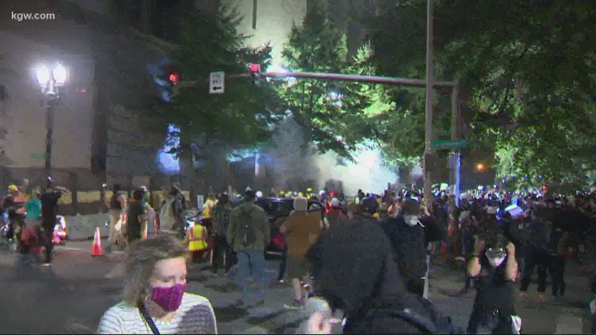 In the early morning hours, federal officers in Portland used tear gas, flash bangs and less lethal rounds to push protesters away from the courthouse.