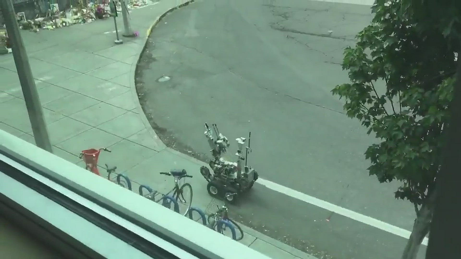 Video of a bomb detection robot at the Hollywood Transit Center memorial, June 9, 2017, Credit: Andy Ngo