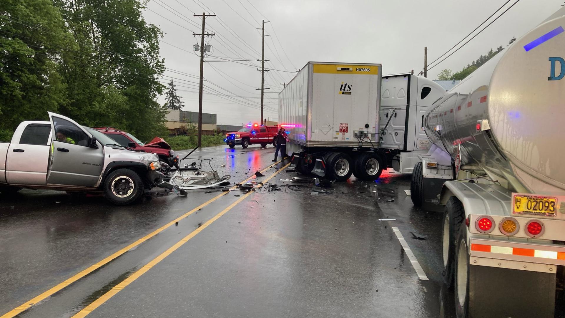 A crash involved two tractor trailers and three vehicle closed a stretch of Highway 30 in both directions south of the St. John's Bridge Tuesday morning.