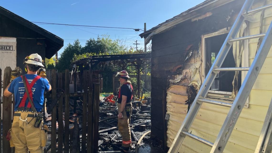 Portland Fire & Rescue said a fire spread from a shed to two homes, with crews fighting the blaze. One person was inj...