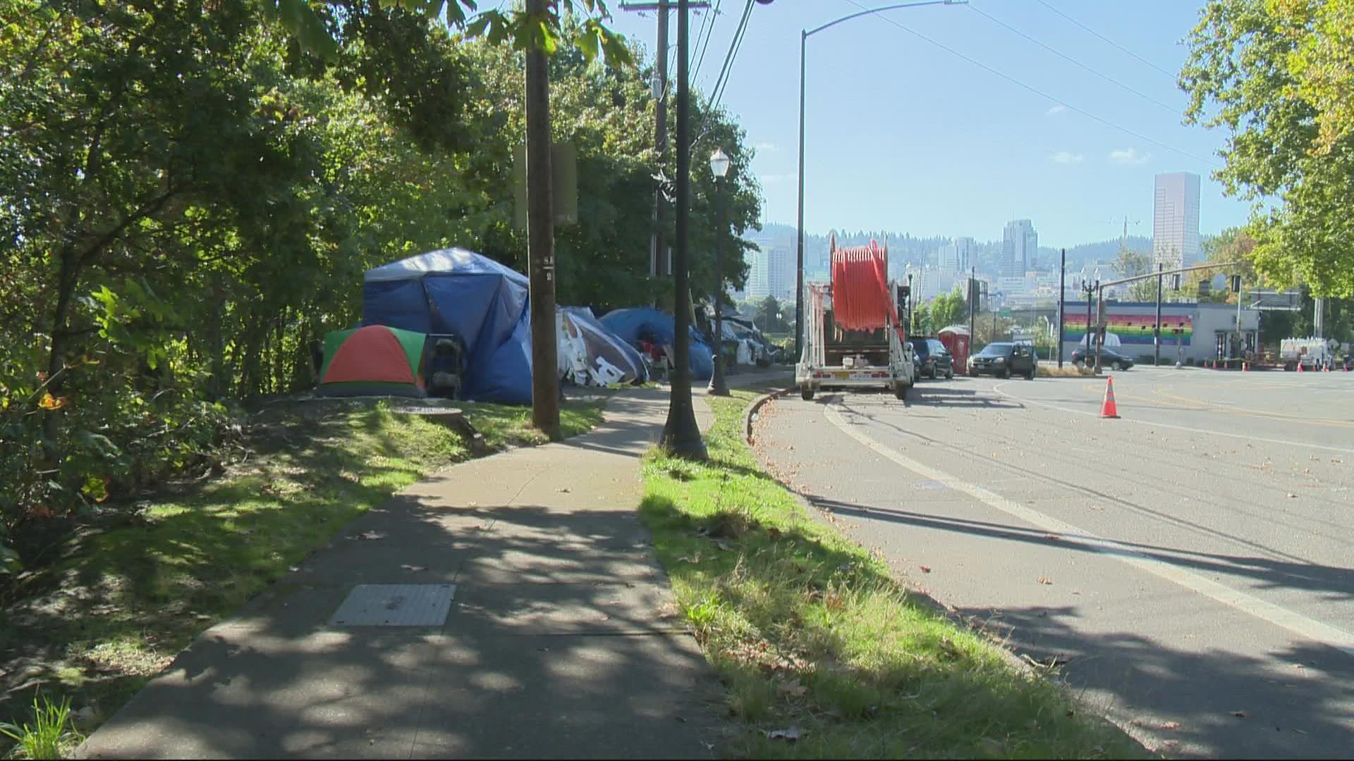 Crews will install a new pedestrian and bike bridge along I-84 this weekend. PBOT said homeless camps in the area will not interfere with construction.