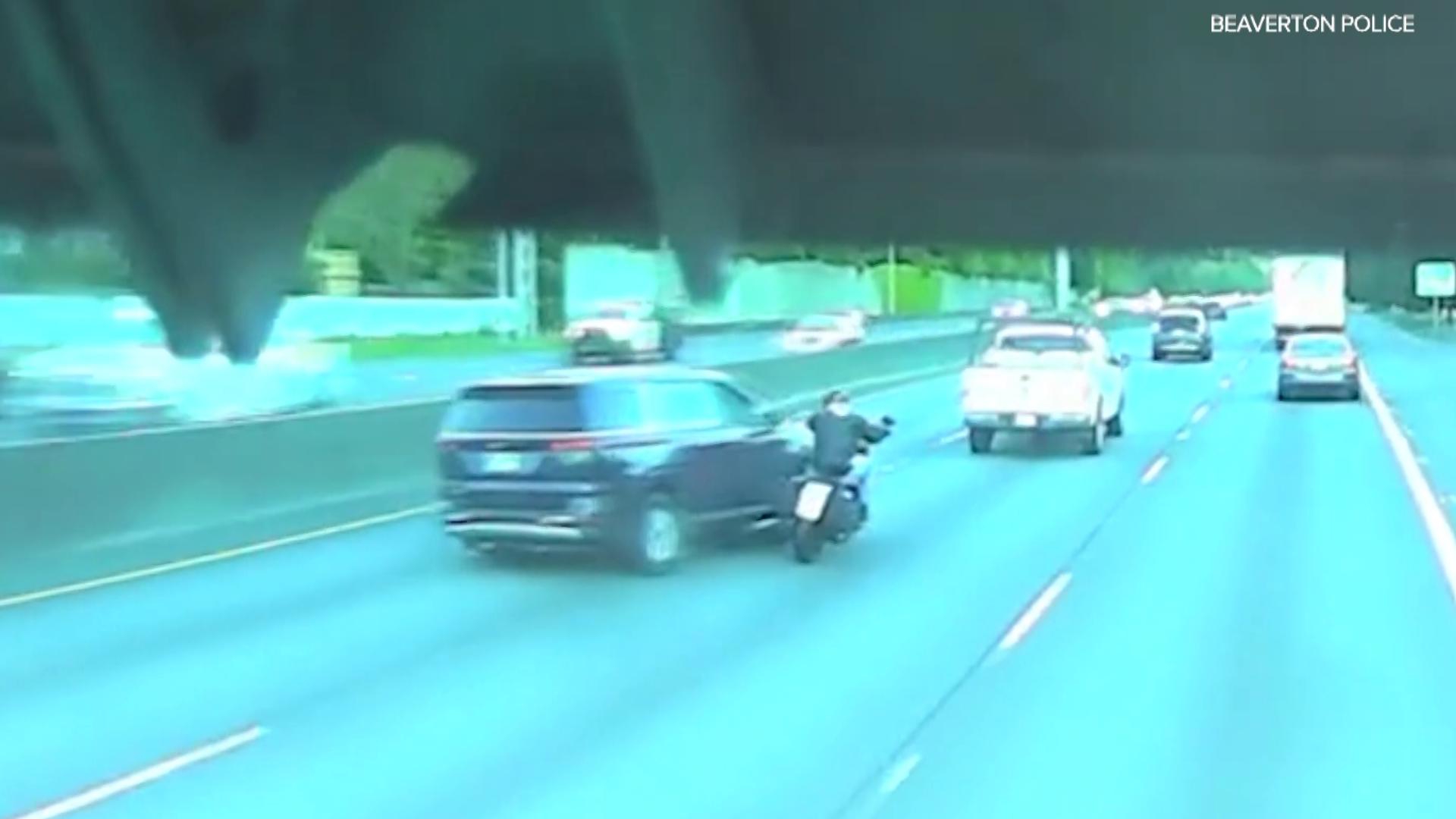 Police are looking for the driver of a blue late-model Kia Carnival who intentionally sideswiped a motorcycle rider, leaving the man seriously injured.