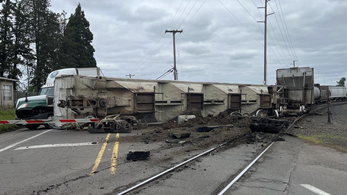 Freight train derails in Salem, striking semi-truck