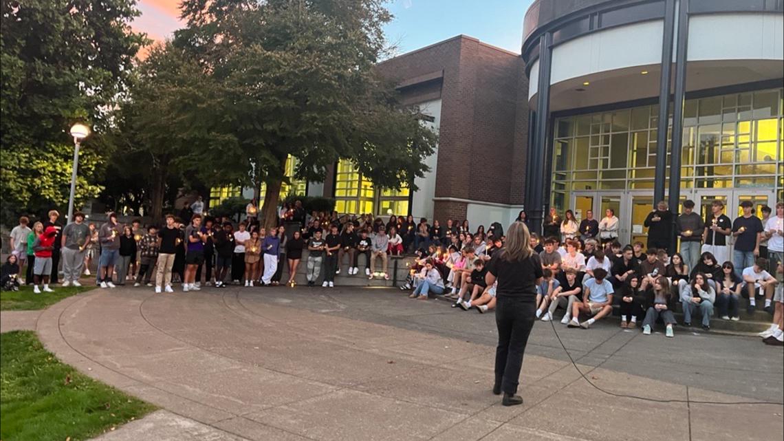 Community holds vigil for high school students injured in accident