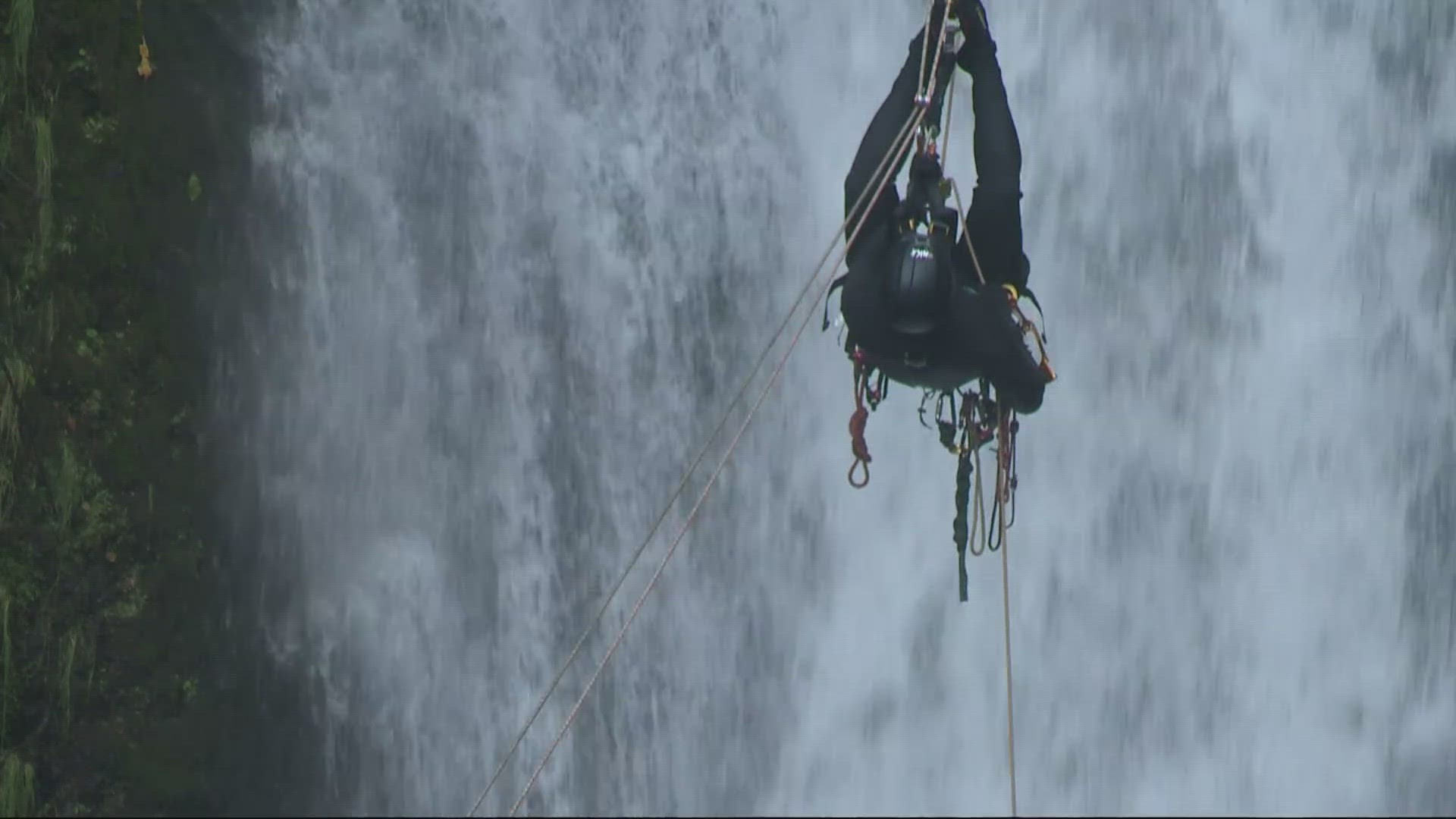 While practicing rope techniques on Oregon's tallest waterfall, an all-volunteer team of search and rescue crews also helped pick up trash.