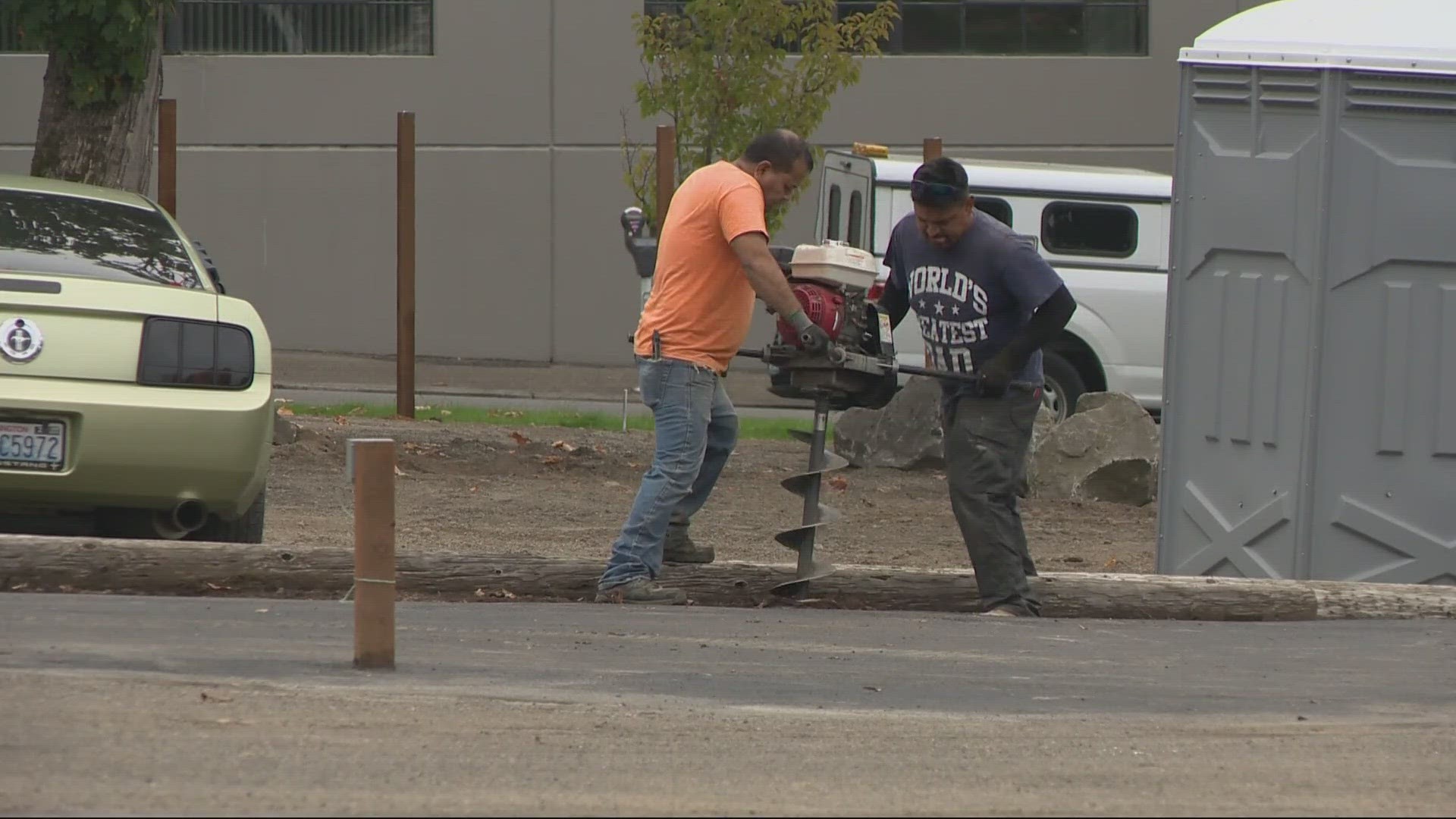 After delays, the downtown location of a new outdoor shelter for homeless people is finally close to an opening. Neighbors are trying to stay hopeful.