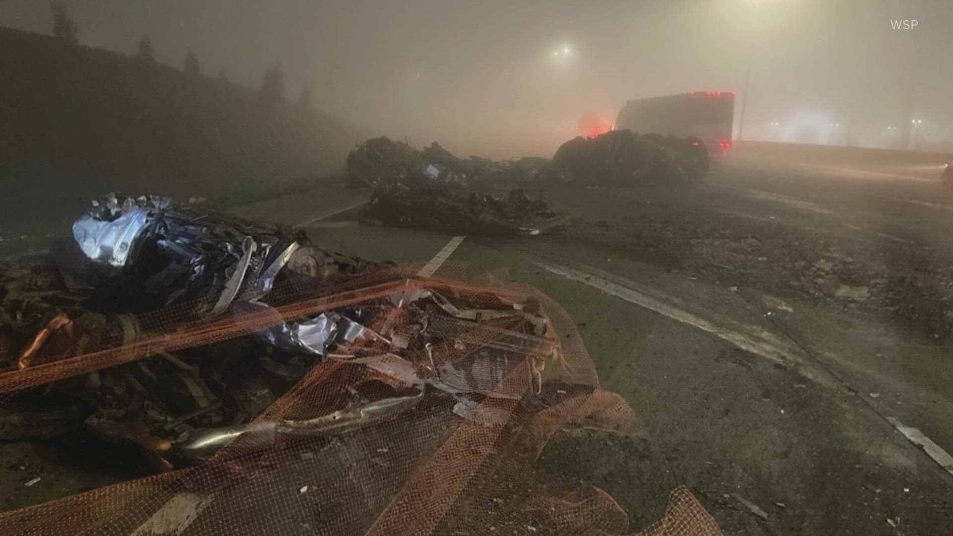 A semi-truck hauling junk vehicles rolled and spilled the cars onto southbound I-5 early Wednesday morning, closing part of the highway completely for hours.